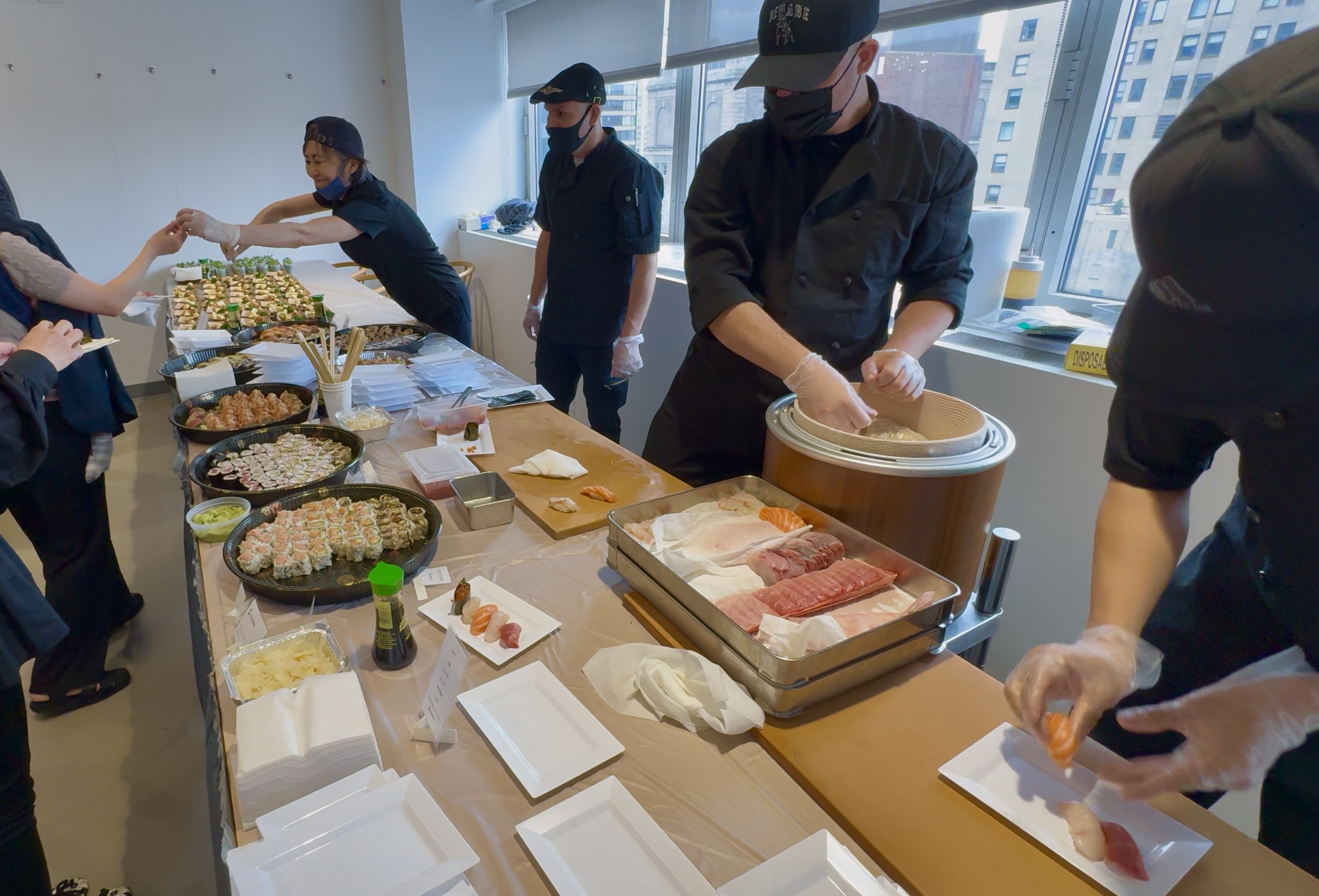 chefs serving at catering service site