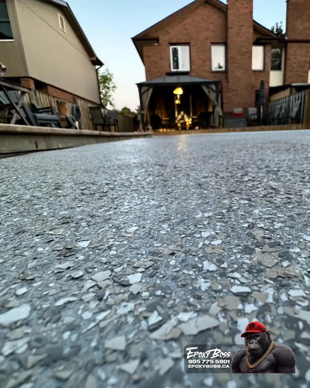 Stayner outdoor landing coated with durable epoxy floor system.