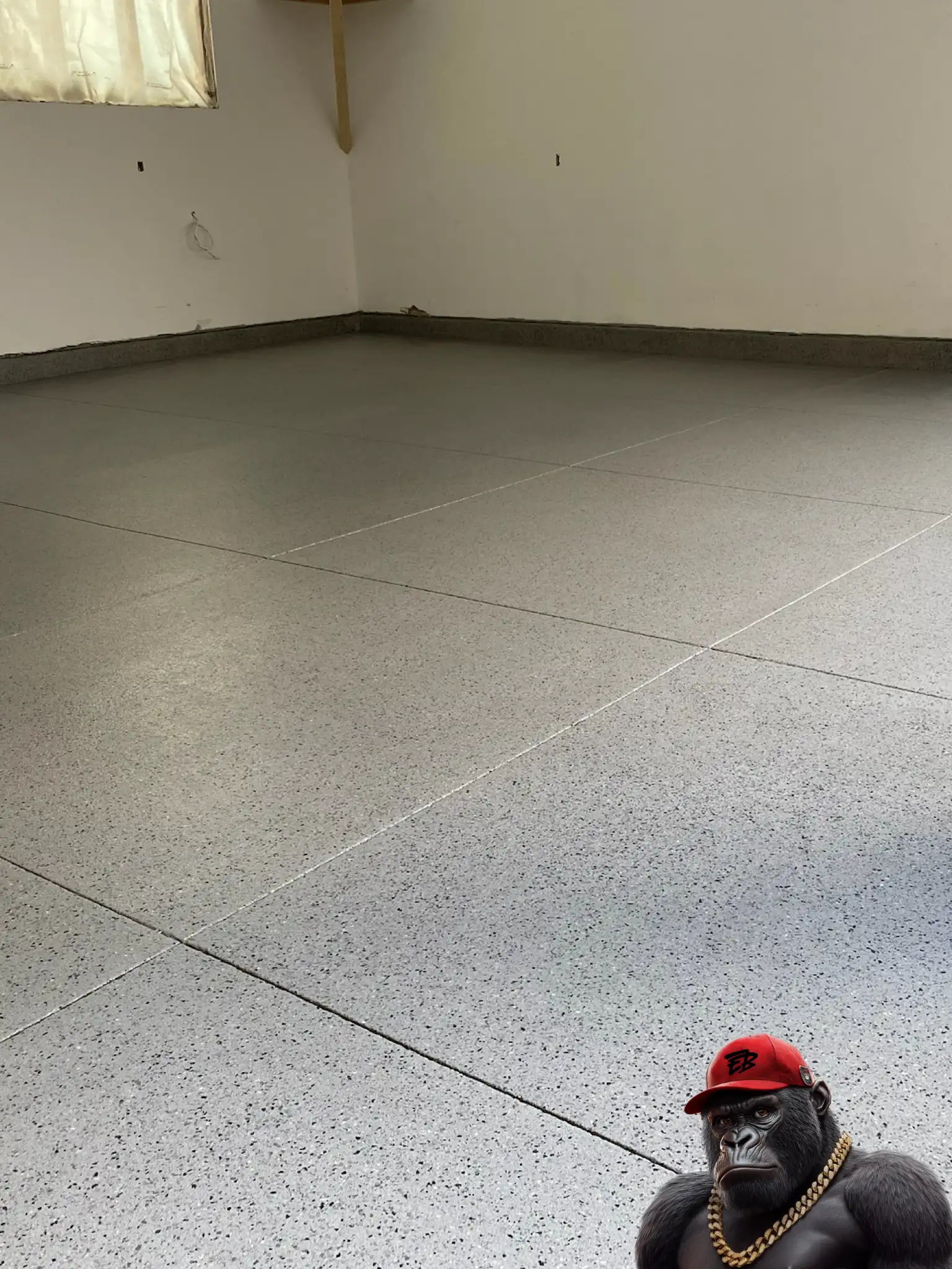 Muskoka garage concrete floor coated with decorative flakes.