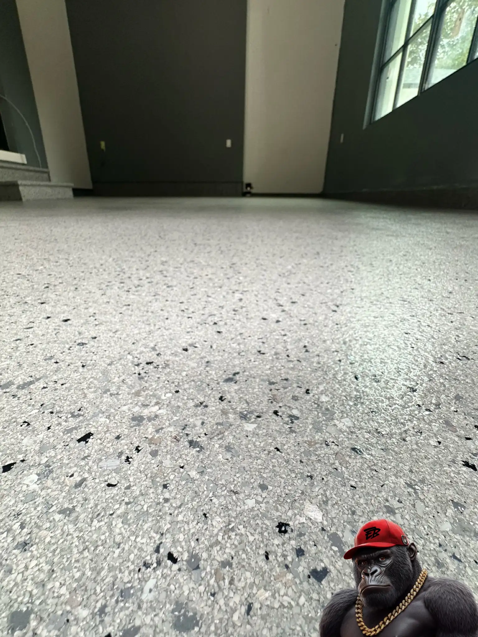 Orillia epoxy floor system for modern residential garage.