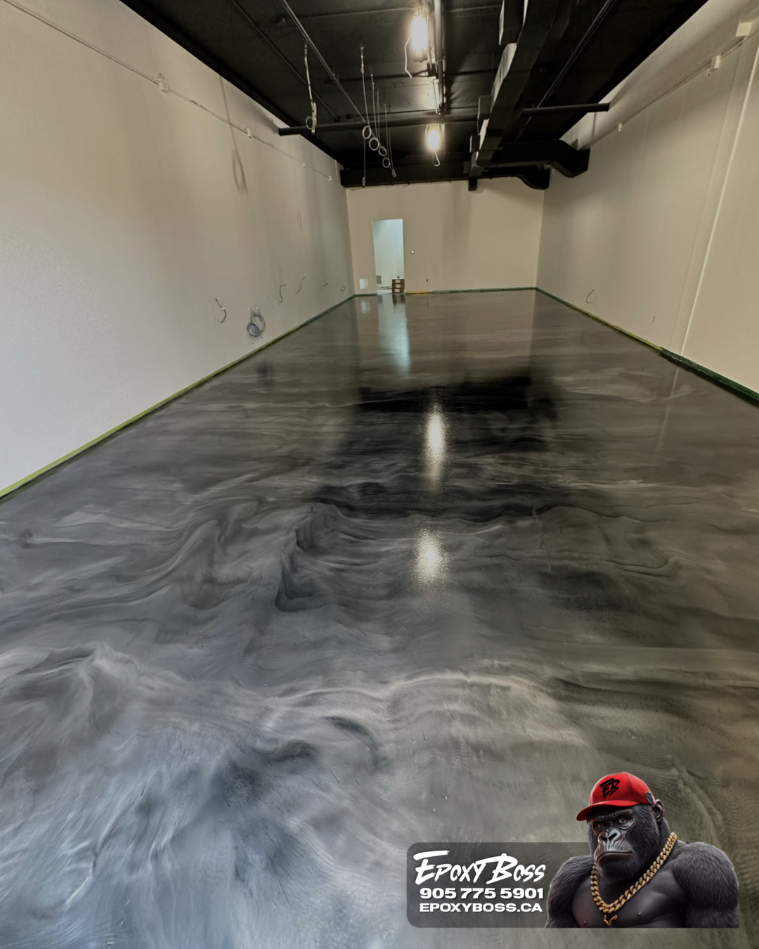 1080 sq ft metallic epoxy flooring project in Hamilton Ontario. High-gloss, durable retail floor system.