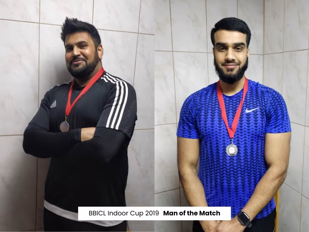 2 outstanding players and man of the matches photographed wearing medals after winning indoor cricket match