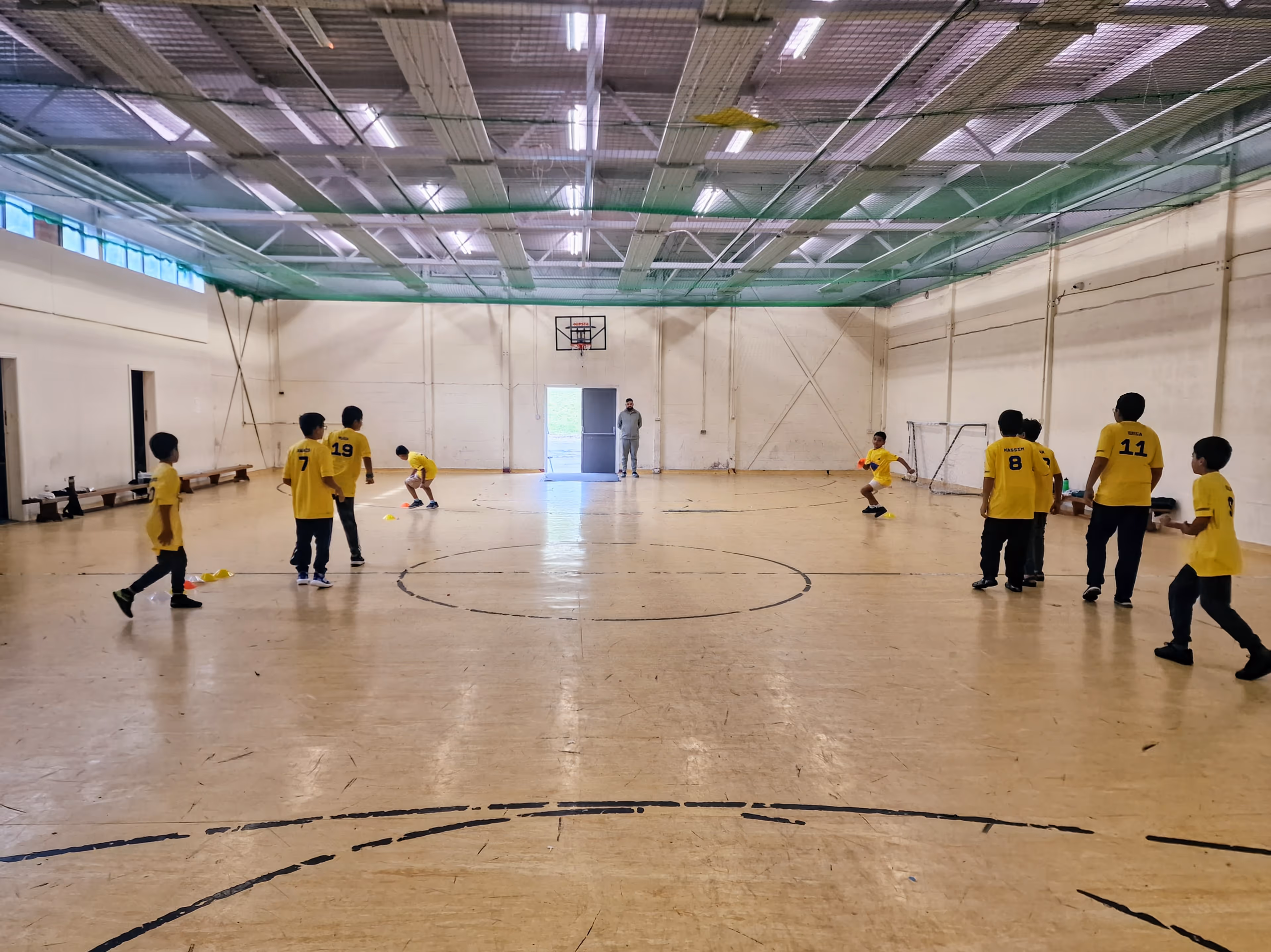 2 group fielding drill. Players running to the cones