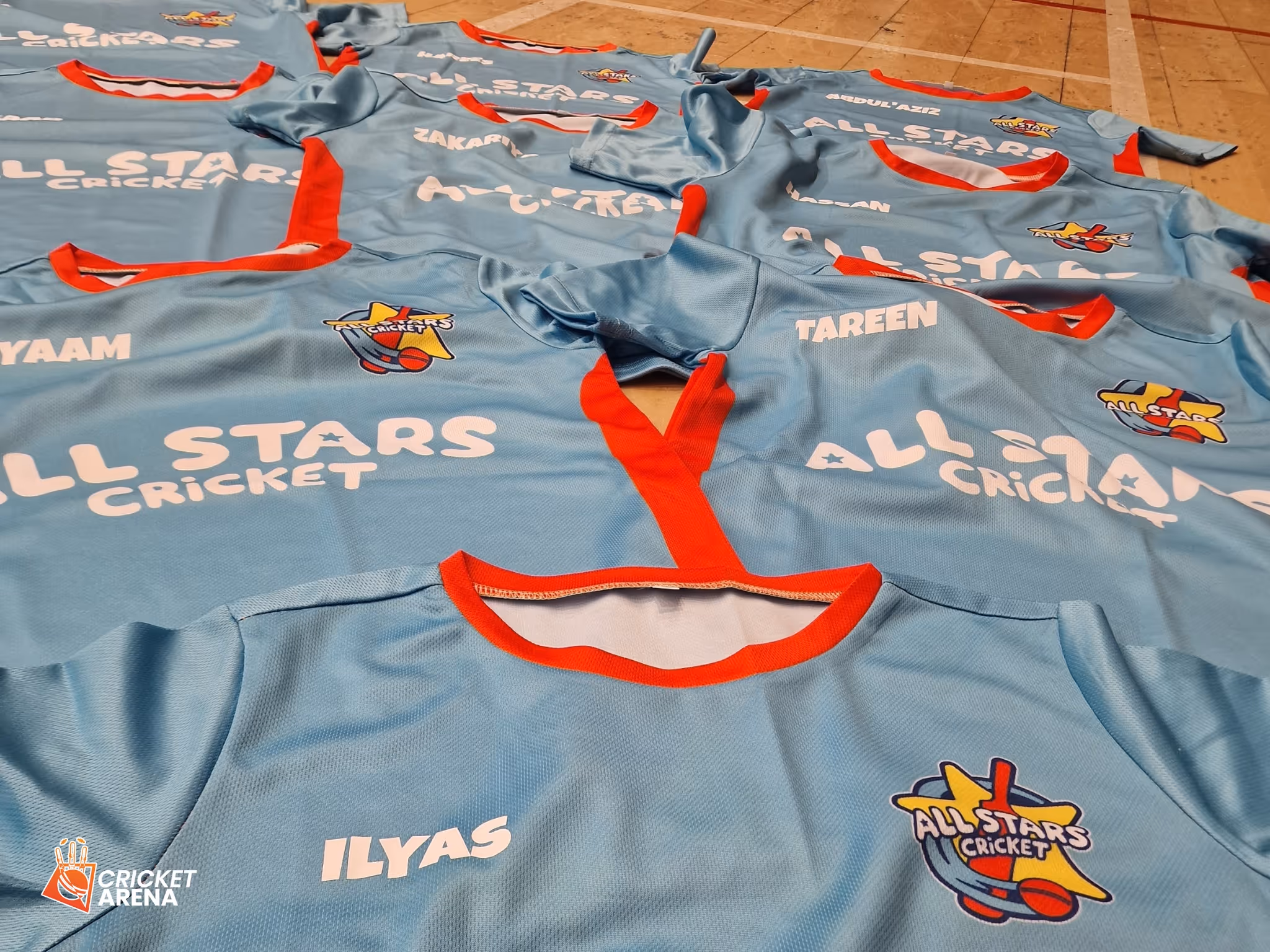 ECB All Stars Cricket kits with participant names laid out on the floor, ready to be distributed free of charge to young players through Cricket Arena with support from Yorkshire Cricket.