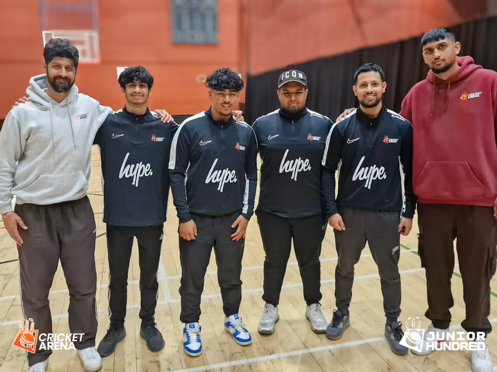 Cricket Arena volunteers and umpires at Concord Sports Centre, Sheffield, wearing branded Cricket Arena x Hype kit during the Junior Hundred tournament — showcasing community involvement, teamwork, and volunteer spirit.