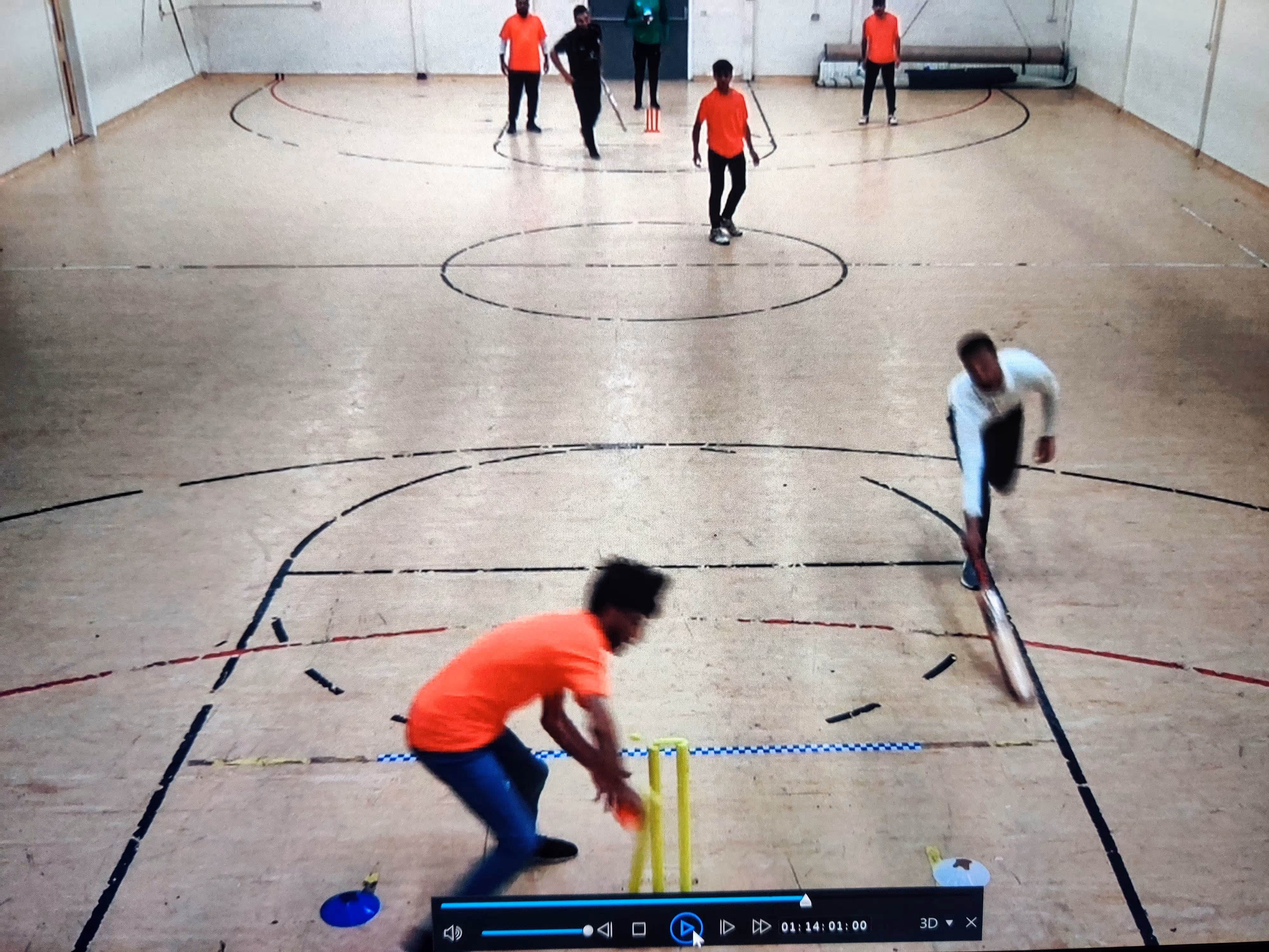 Screenshot from a Cricket Arena Men’s Mini Bash League 2021 match at Yorkshire Muslim Academy (YMA) showing a run-out review in indoor cricket — the batter is out of his crease as the ball hits the stumps.