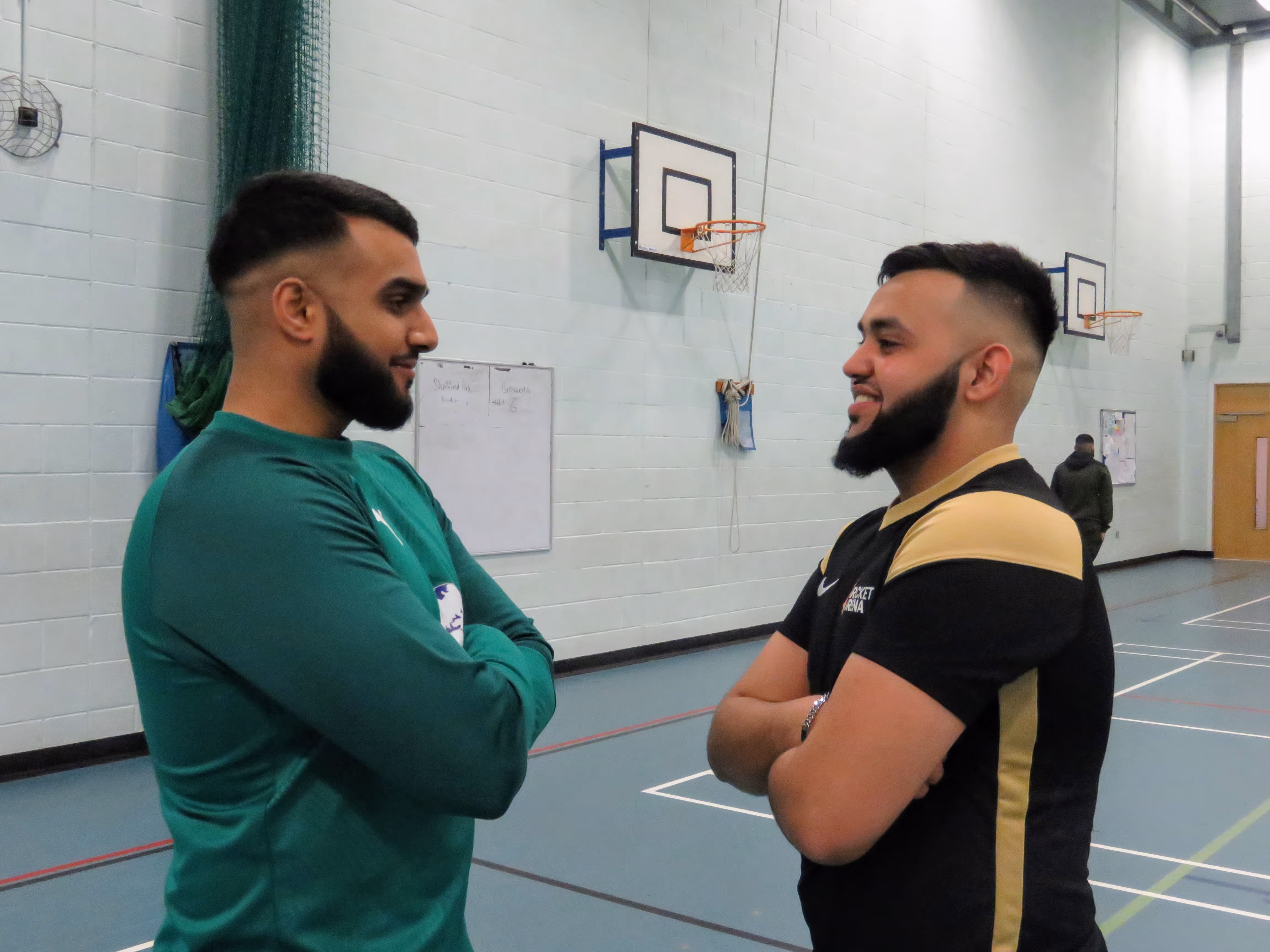 Captains Zobair Khaliq of Firth Park Warriors and Jawad Akhtar of Darnall Dynamites face off before the Sheffield Cup 2022 final at the toss — calm before the storm of an intense indoor clash.
