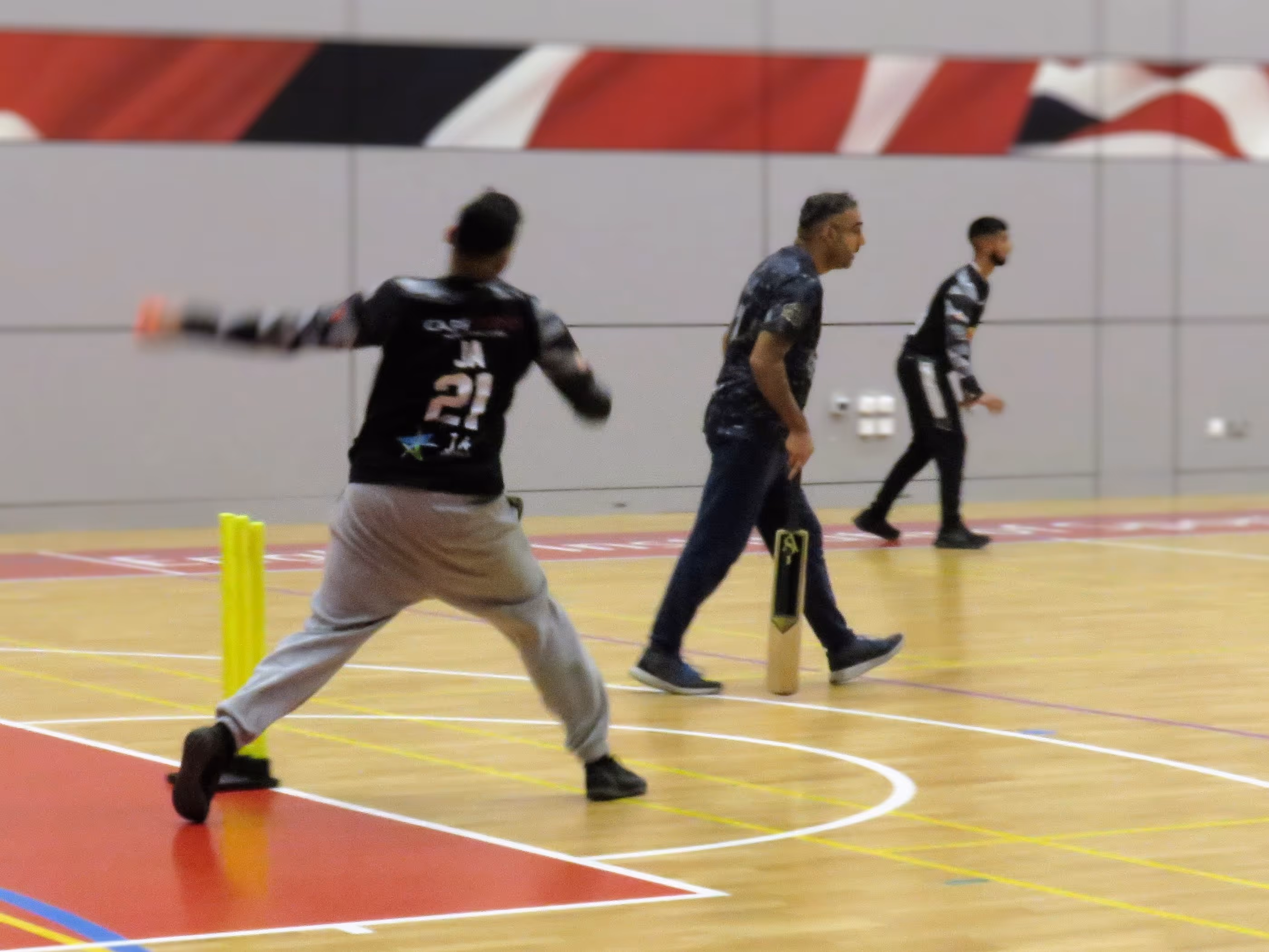 Jawad Akhtar bowls a quick left arm delivery mid action during Cricket Arena Sheffield Indoor Cup at EIS indoor