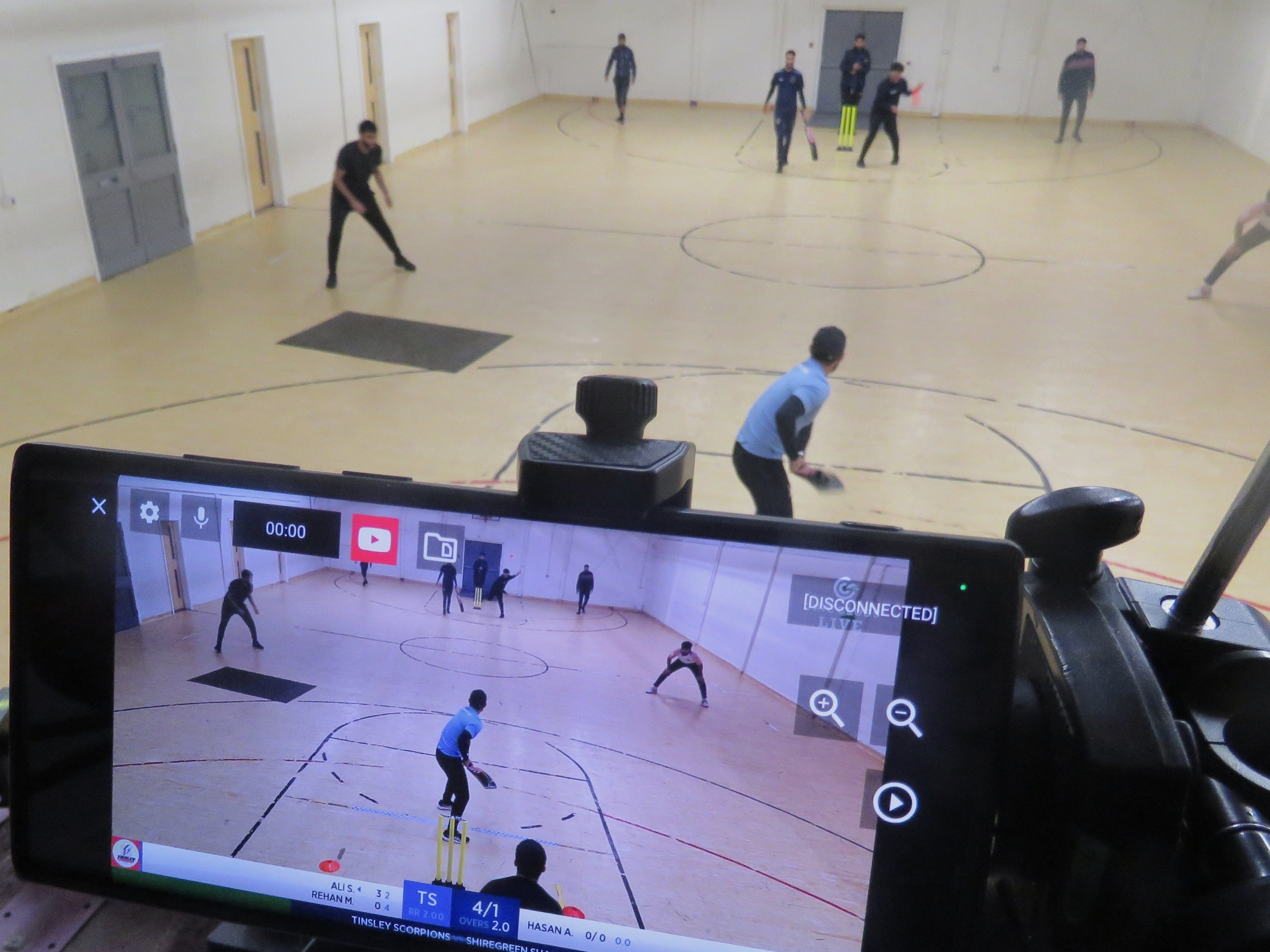 Phone records live indoor cricket match using CricClubs app during MBL 2022 youth league in Sheffield