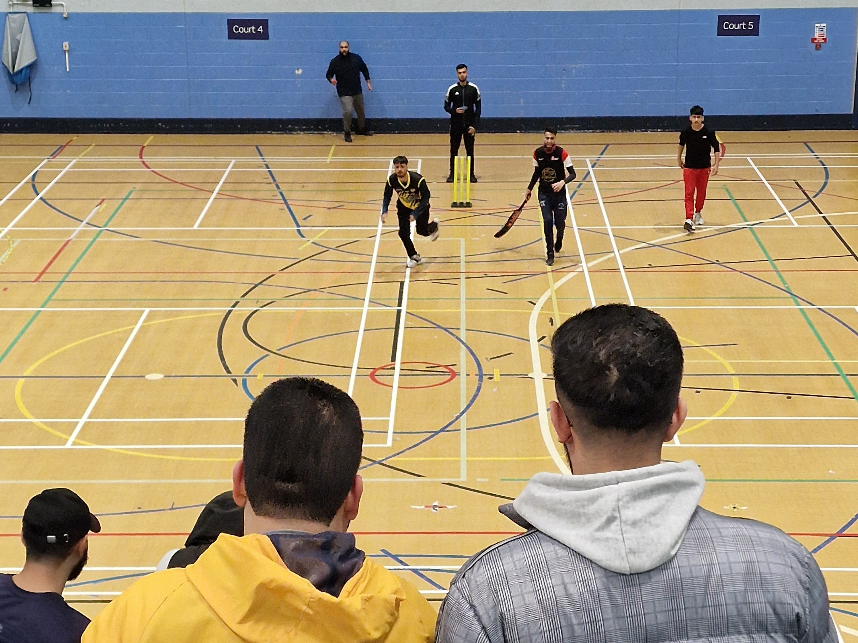 Commentators watch the action from the balcony during Sheffield Cup 2023 indoor cricket at Hillsborough.