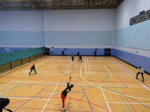 Wide-angle view of indoor windball cricket at Hillsborough Leisure Centre during Sheffield Cup 2023.
