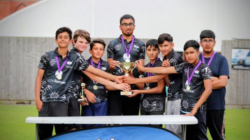 Sheffield’s Sharrow Stars celebrate with the trophy after winning the Yorkshire Junior Hundred 2023 at Park Avenue, Bradford.