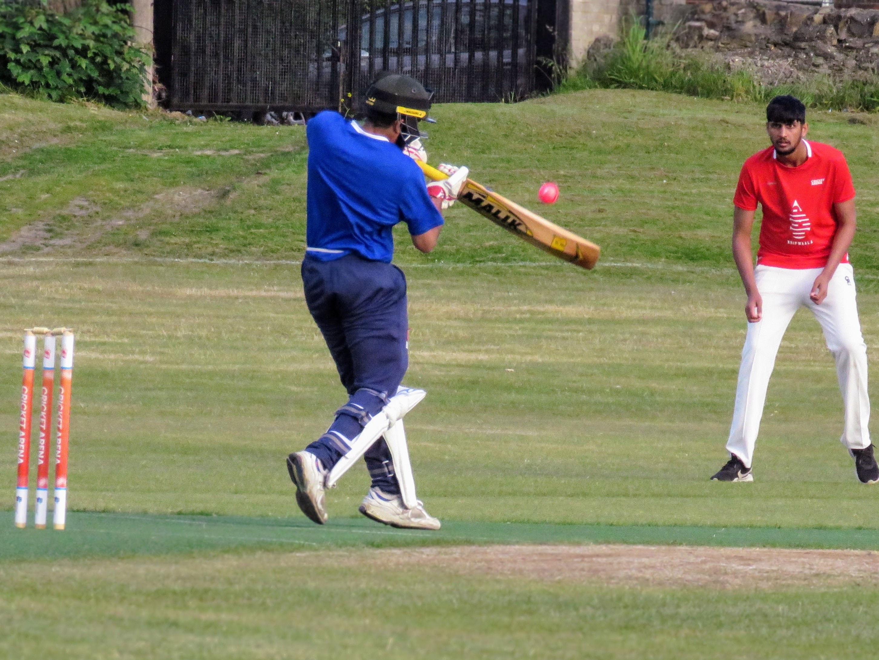 Bilal plays a powerful pull shot for six as the fielder watches in awe during the Red v Blue Youth Hundred match.