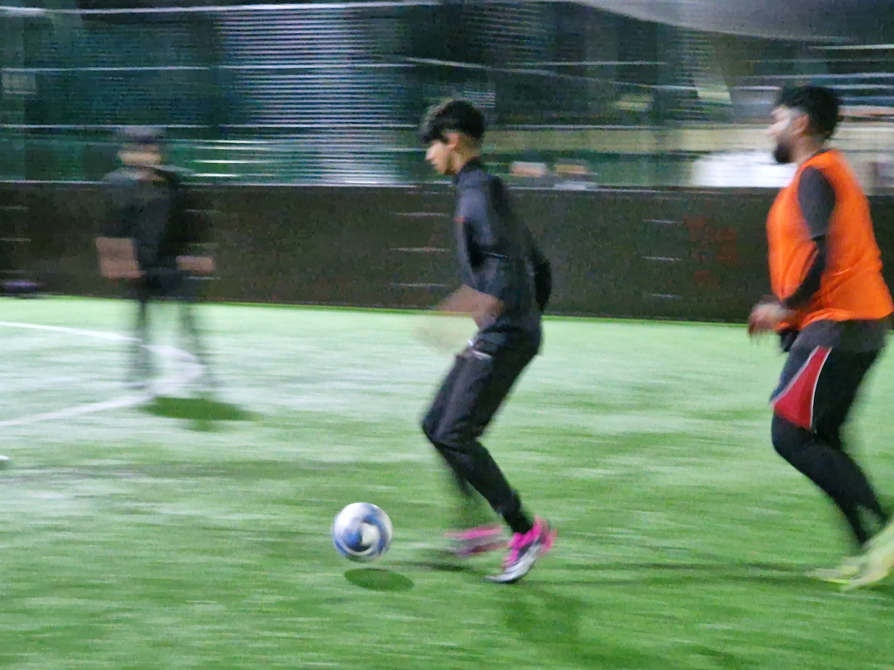 Young player dribbles the ball past a defender during community football at Davy Sports Club Sheffield supported by Barclays Community Football Fund