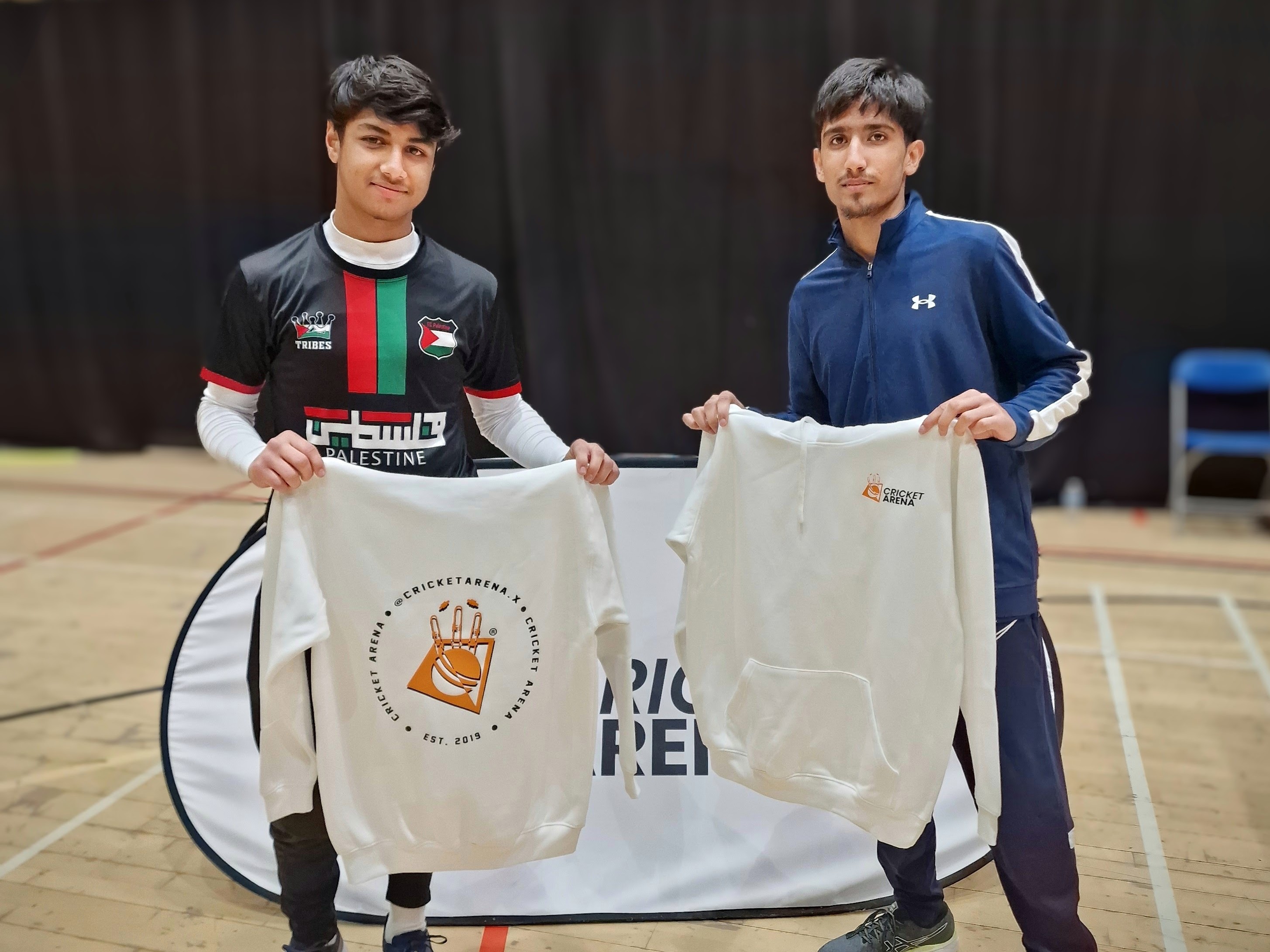 Rizwan Ishfaq and Musa Altaf receive Cricket Arena hoodies at MBL 2023 Finals Day, recognised for Yorkshire pathway success.
