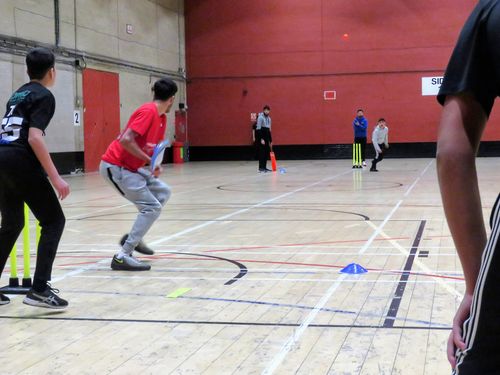 A spinner bowls as the batter prepares to hit during windball action at MBL 2023 in Concord Sports Centre, Sheffield.