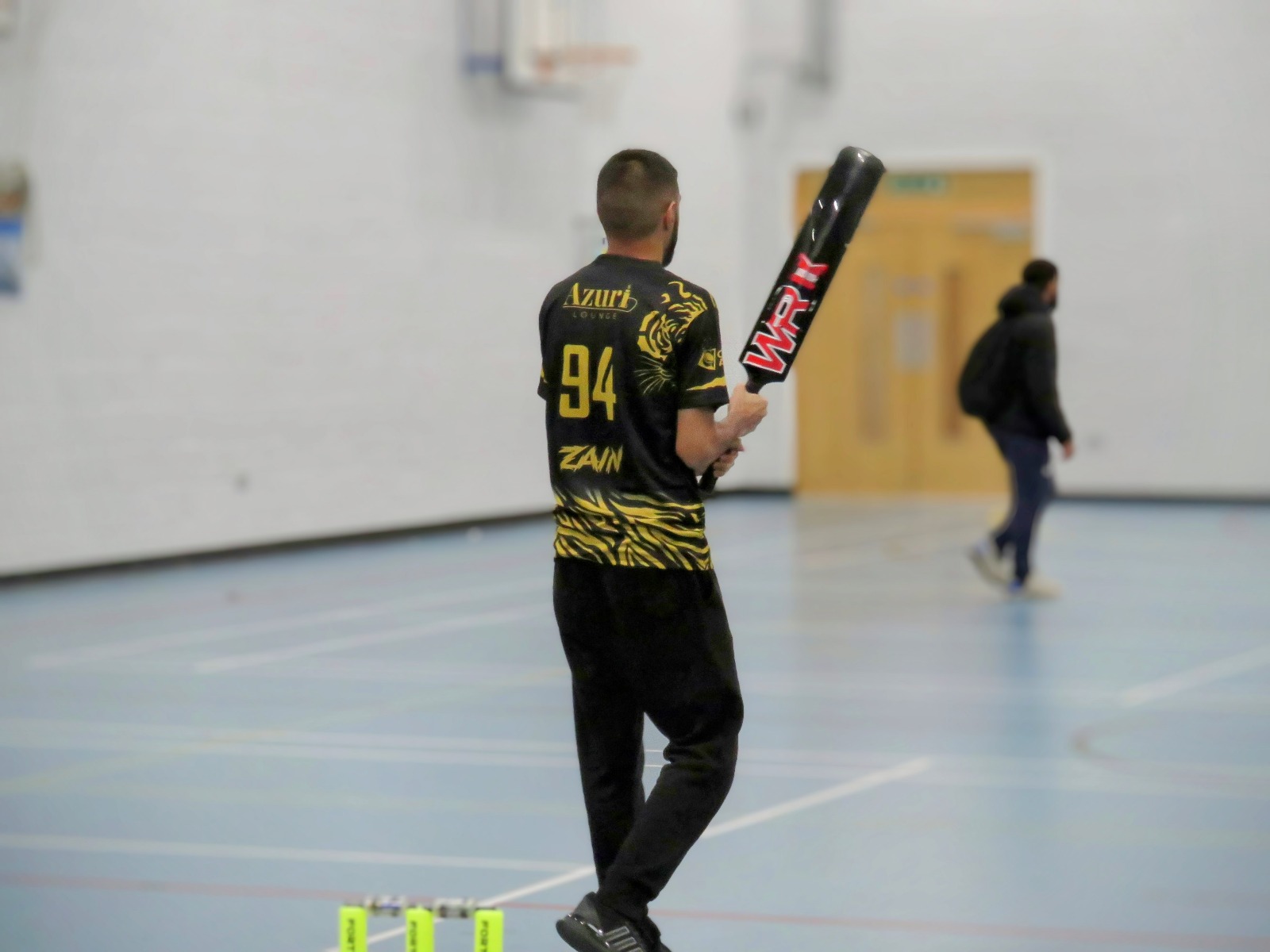 Zain walks to the crease in Burngreave Tigers’ Azuri Lounge kit—focus and belief before facing windball in Sheffield.
