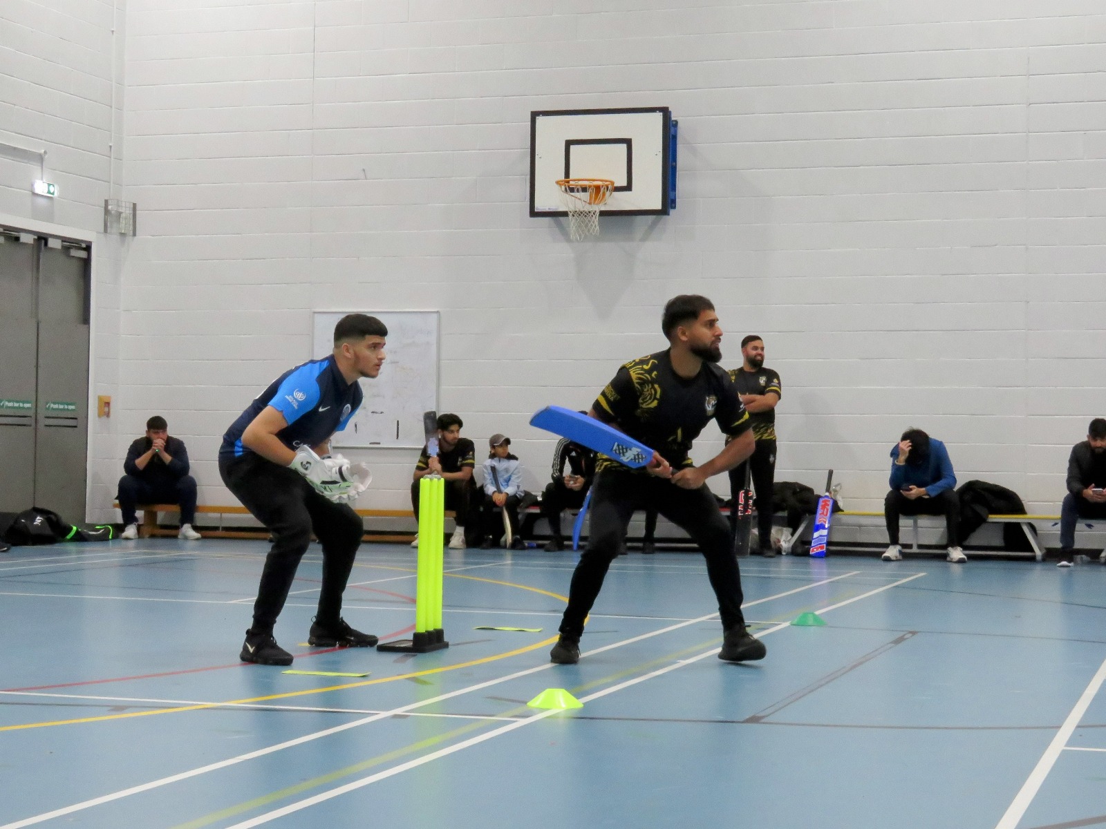 Bilal settles into his stance for Burngreave Tigers—poise and focus against Netheredge at Sheffield Park Academy.