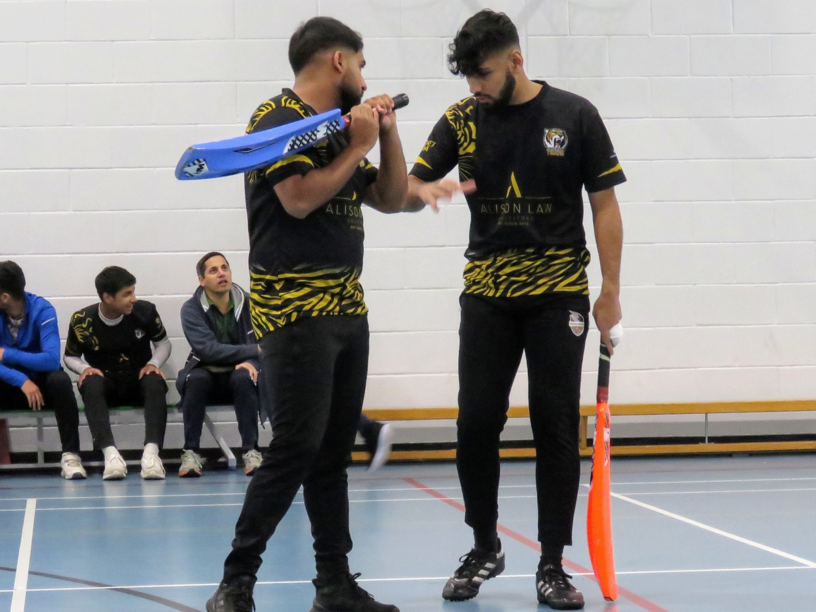 Burngreave Tigers batters plan between overs—partnership and game smarts with fibreglass bats at Sheffield Park Academy.