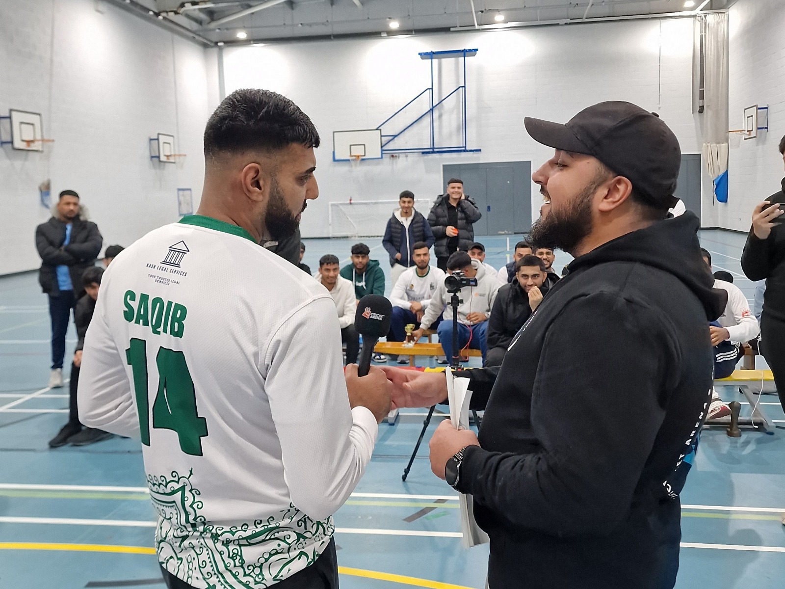 MVP Saqib Hussain is interviewed at the presentation—crowd pride and appreciation at Sheffield Park Academy.
