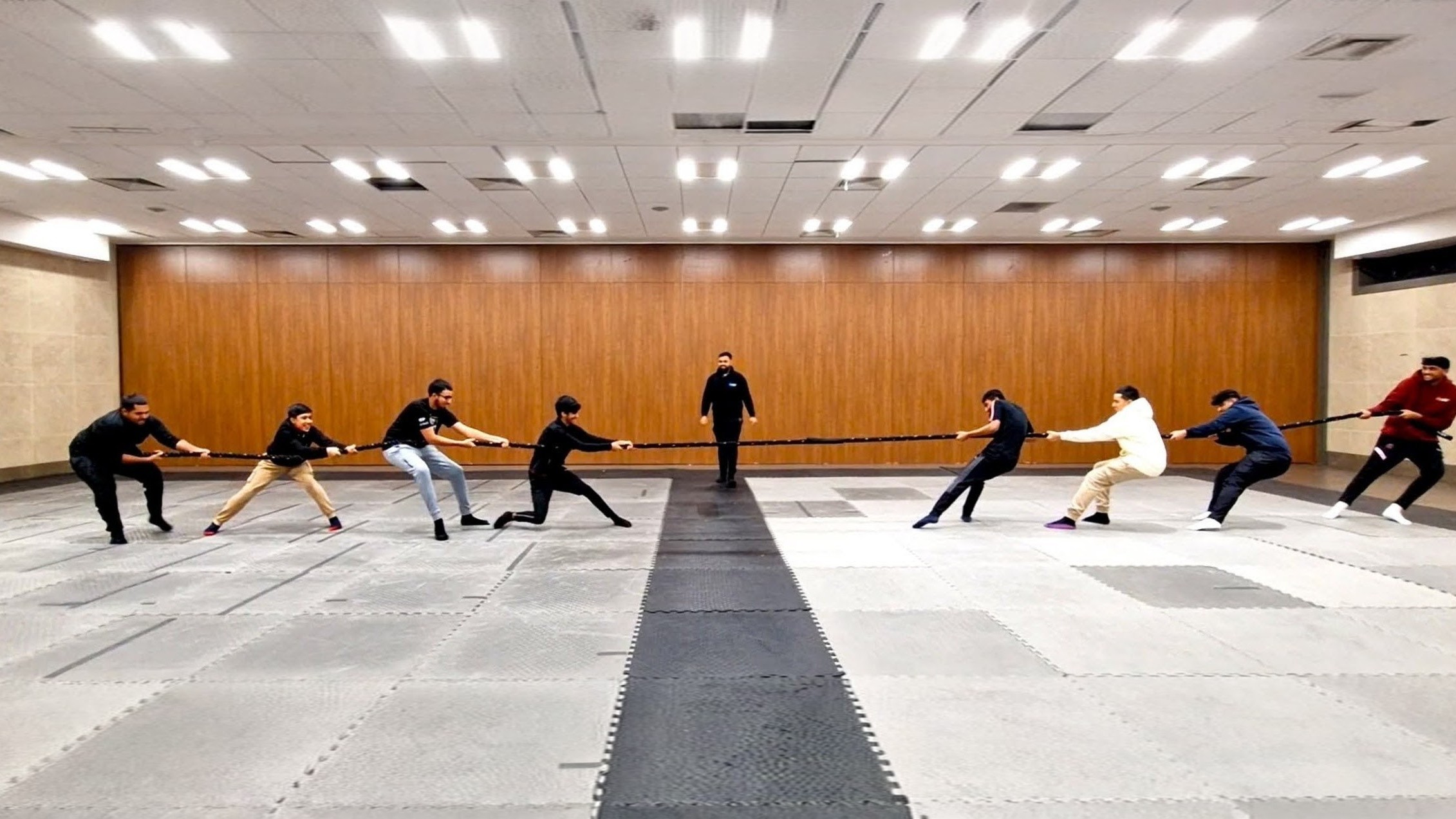 Boys aged 13–17 pull in a tug-of-war during Sports Youth Club at Sheffield Grand Mosque.