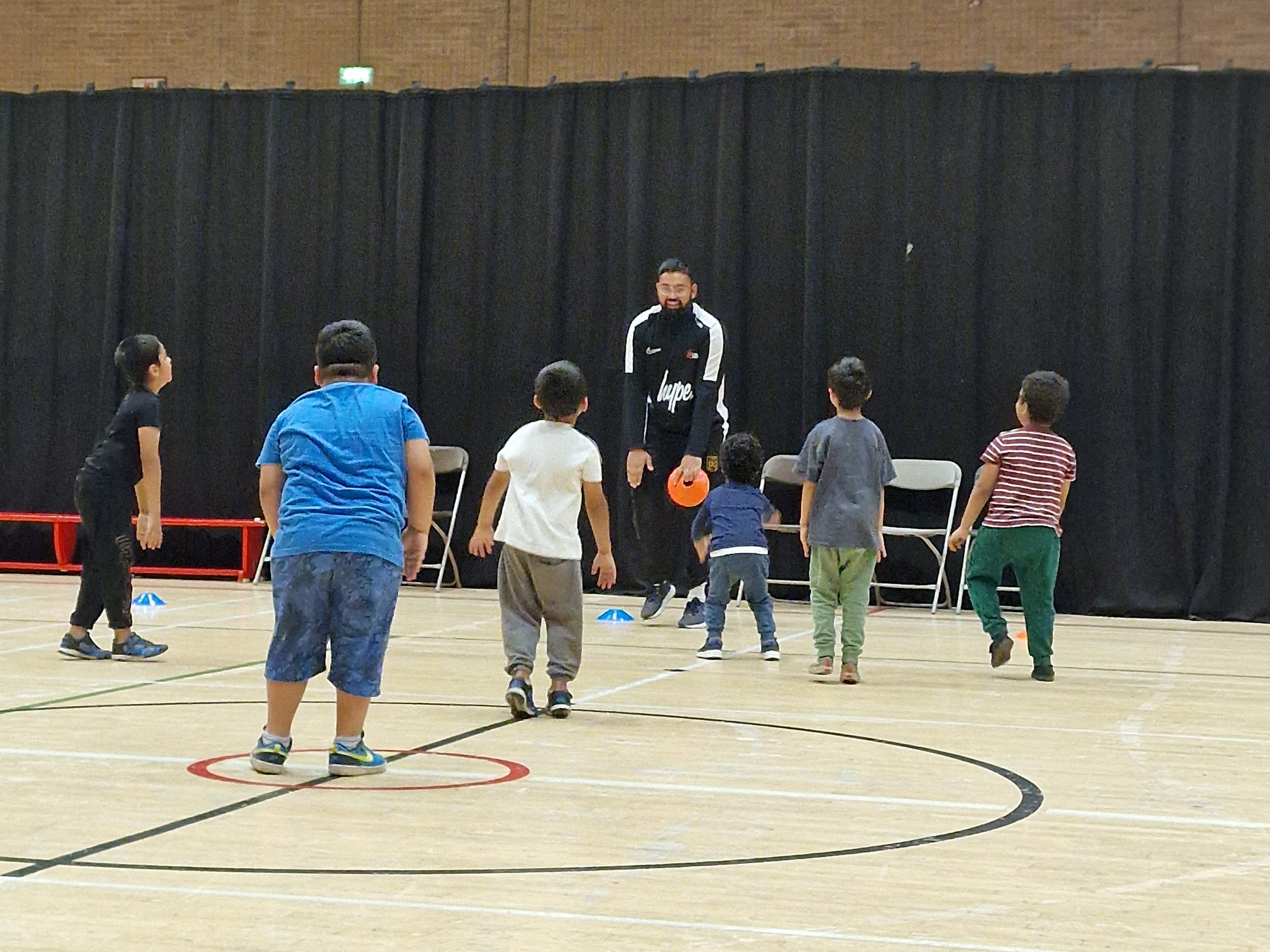 All Stars react to the coach’s call in a fun warm-up game at Concord Sports Centre, Sheffield.