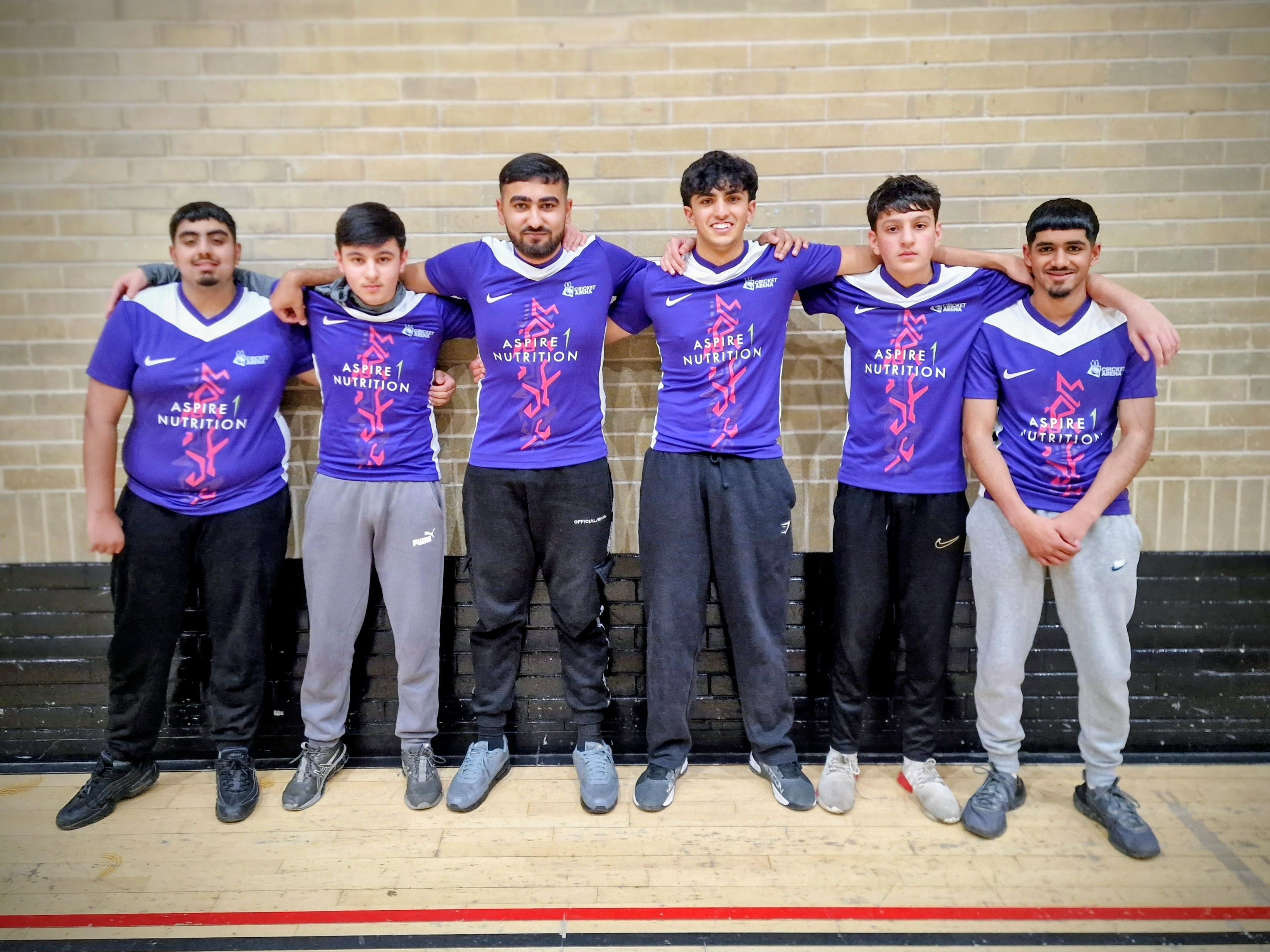 Pitsmoor Avengers under-21 team line up in purple kit at the MBL 2024 indoor league in Sheffield.