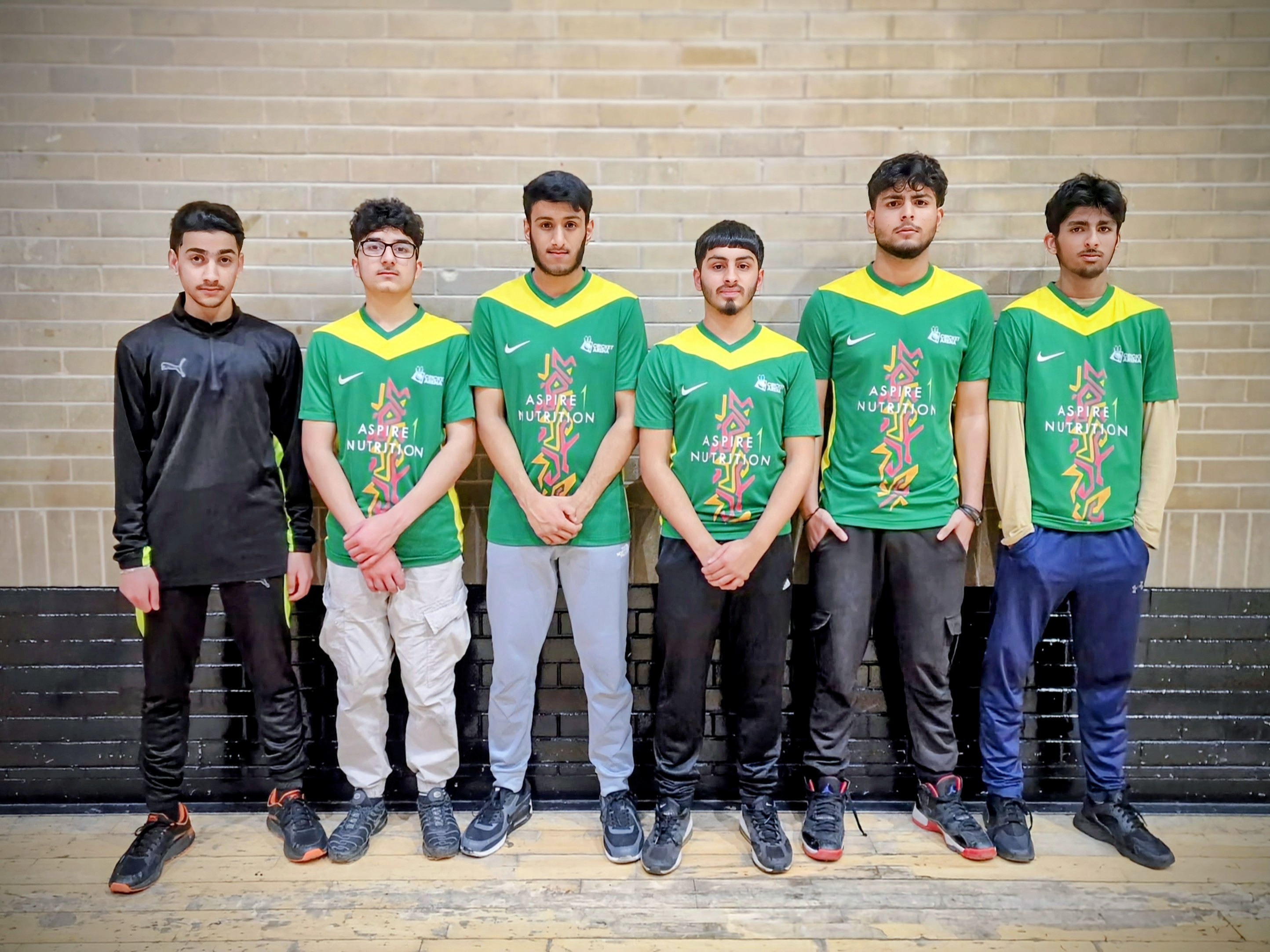 Shiregreen Sharks players stand together in green kit before their MBL 2024 indoor match in Sheffield.