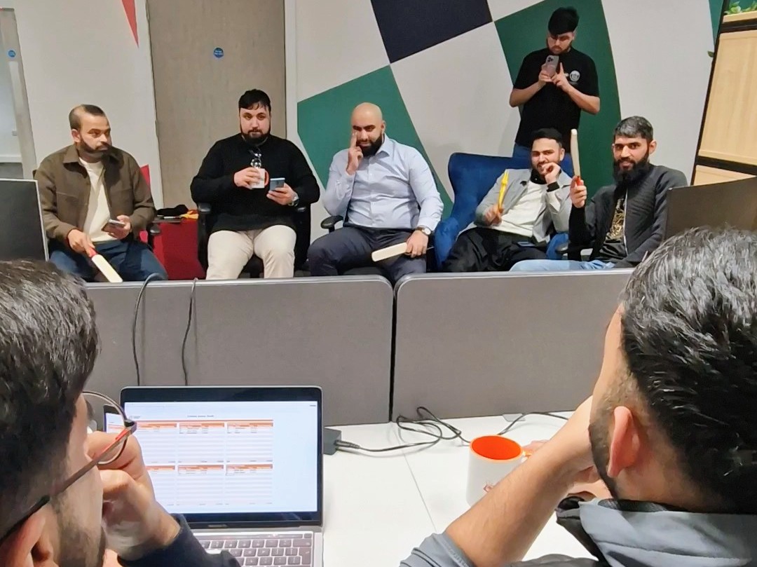 Captains sit with bats ready at the Sheffield Cup 2025 draft night in the Steel City Stadium office on Sheffield Olympic Legacy Park.