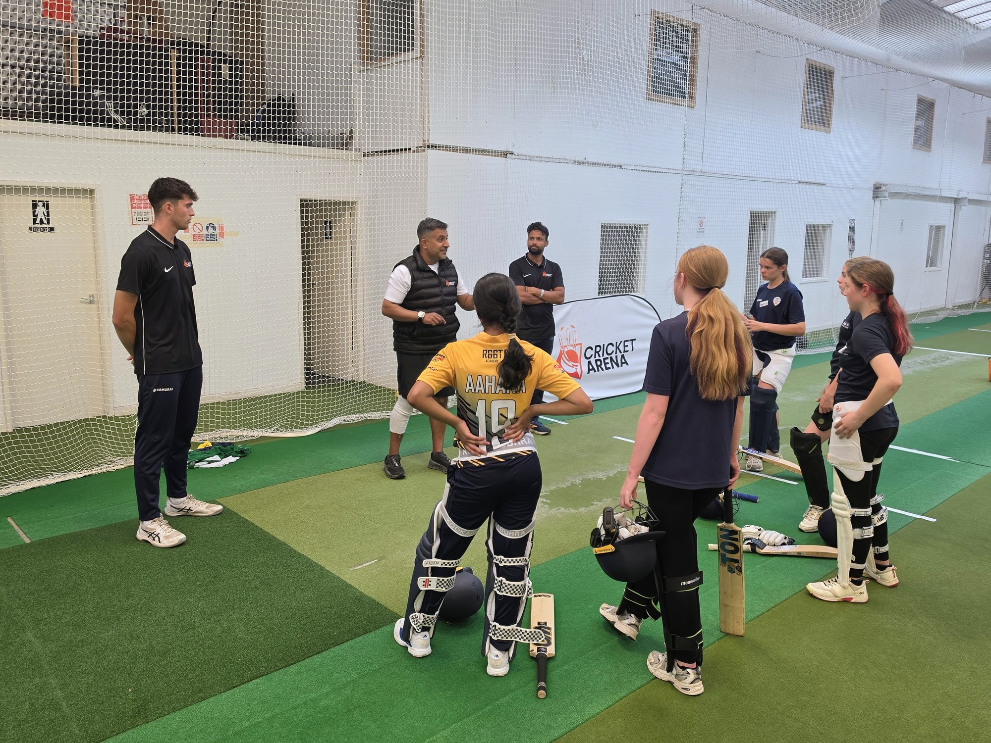 Girls Academy players pad up together at the indoor centre in Sheffield, coaches on hand as the session gets under way.