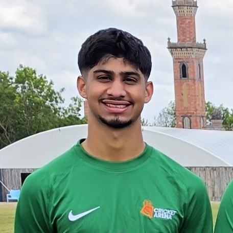 Abubakr, a Cricket Arena player, in the club's green kit