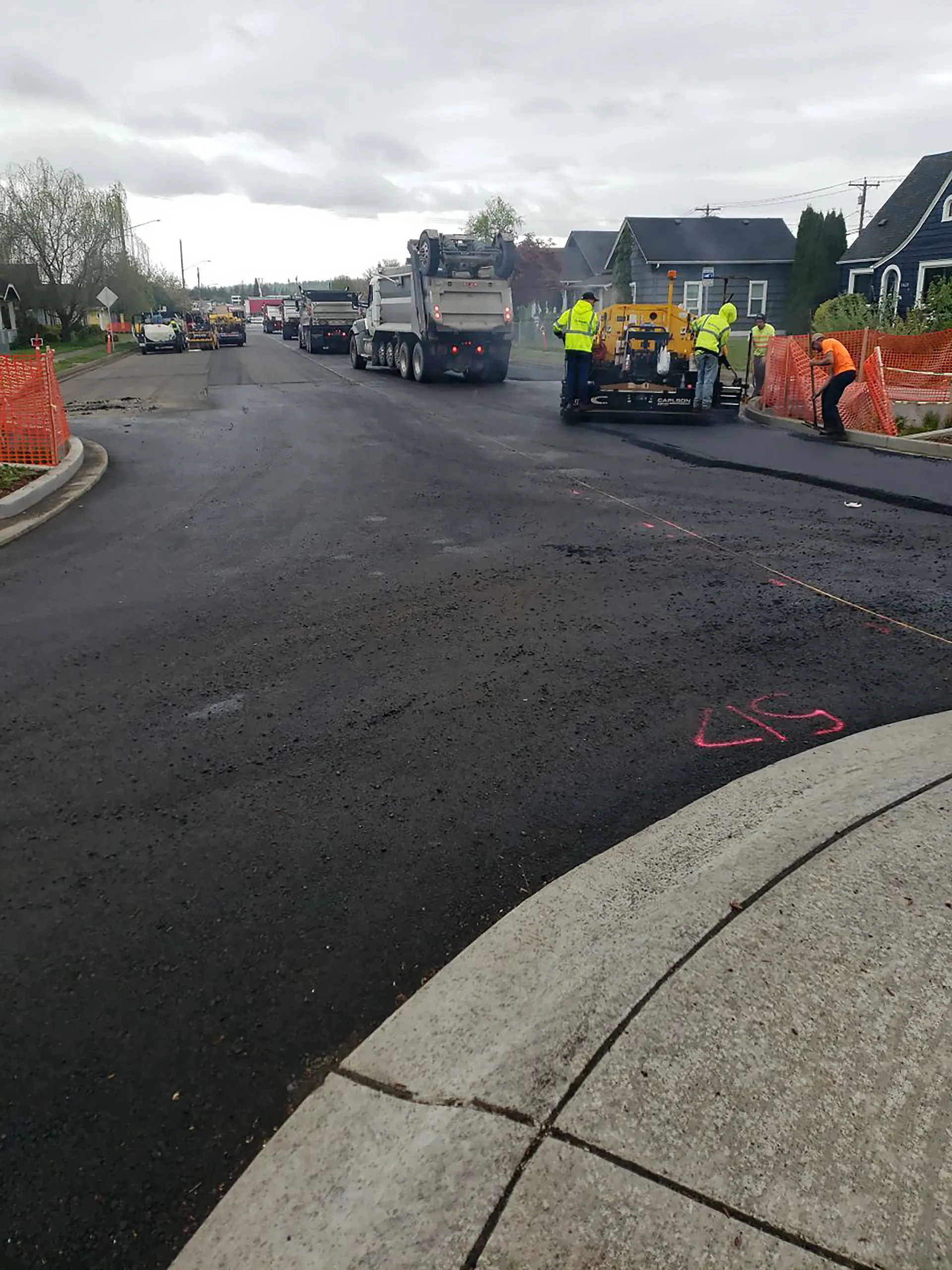 A road with a pink line on it.