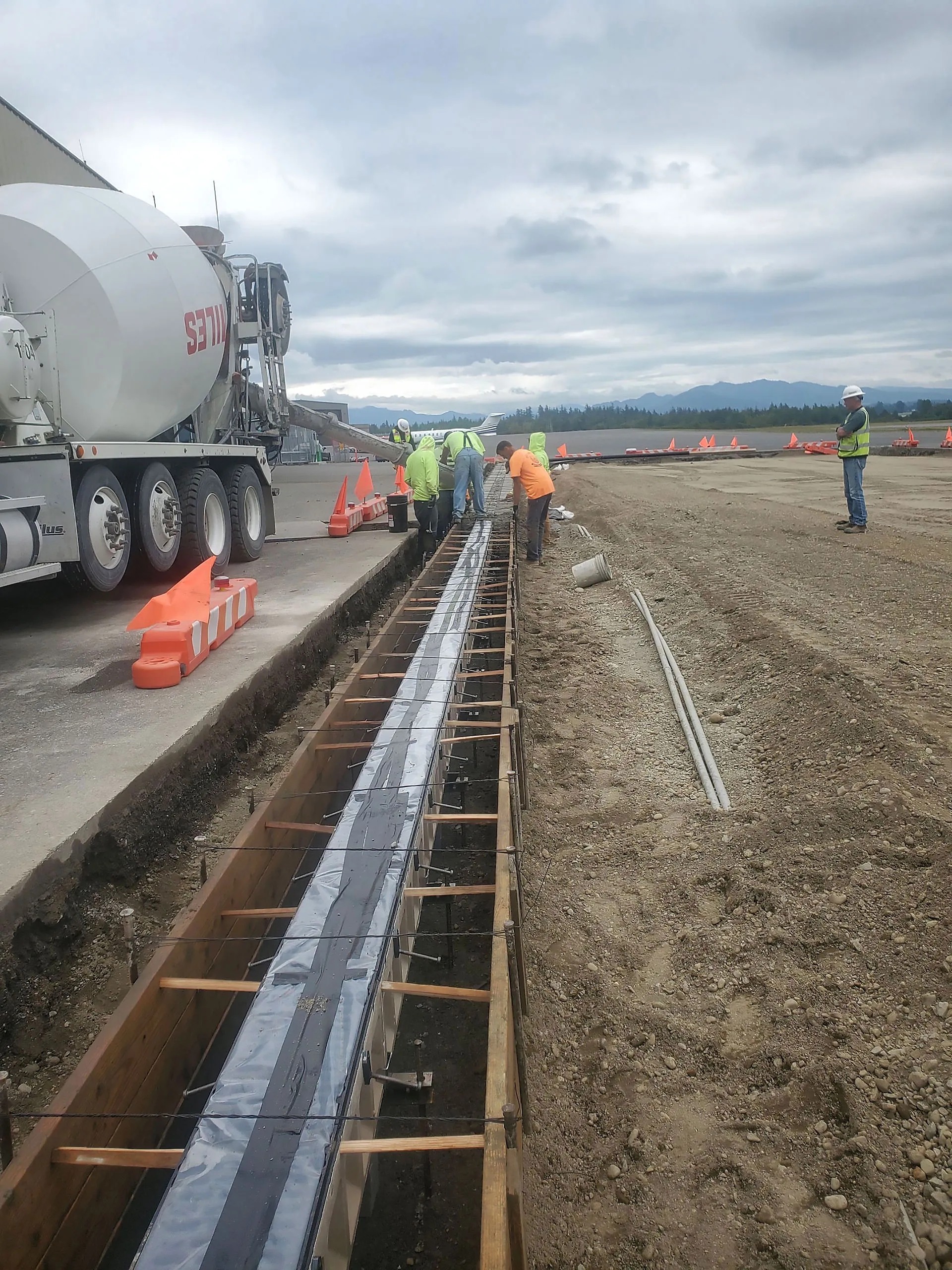 A group of construction workers are working on a project.