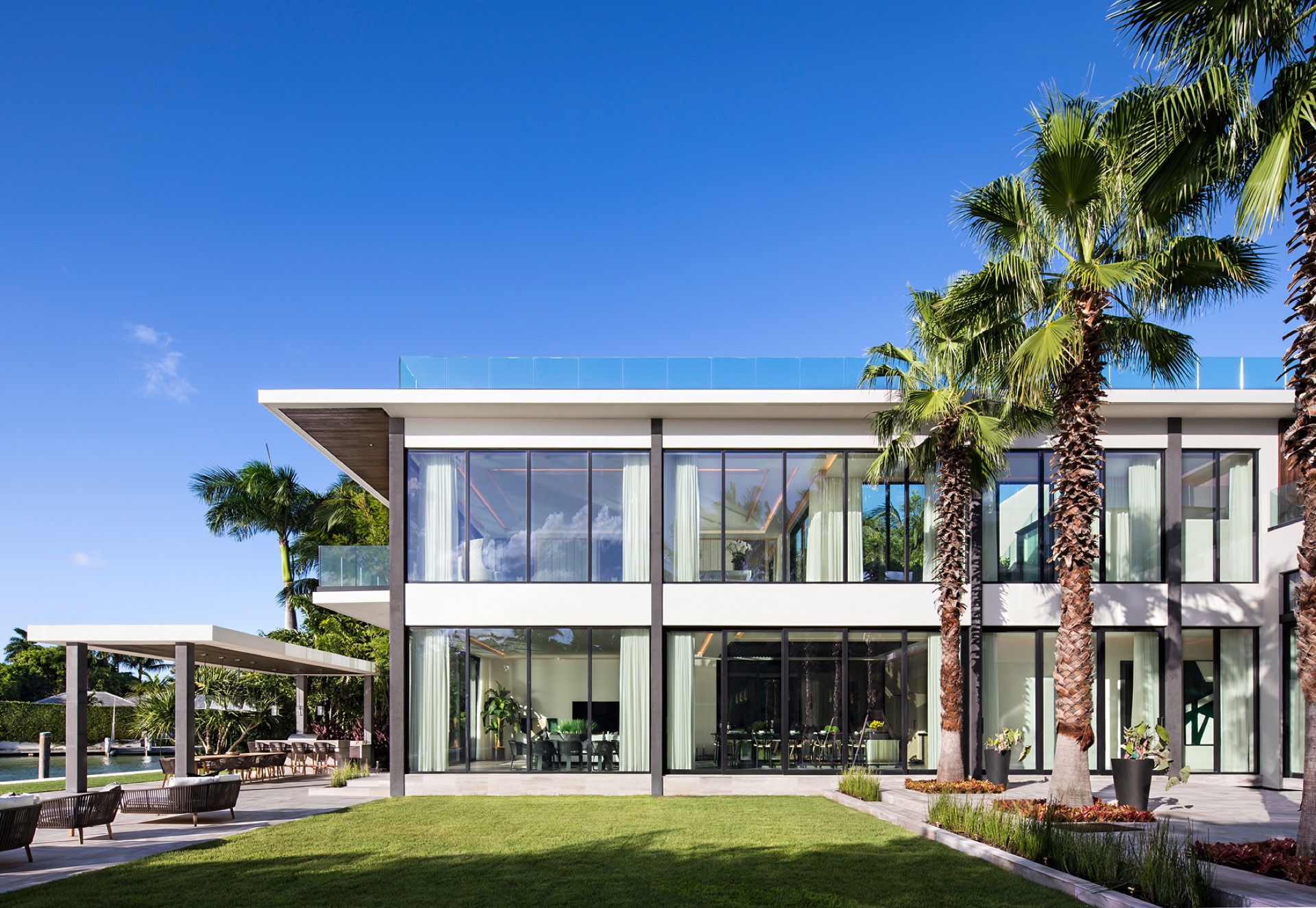 N. Bay Rd. Residence — waterfront contemporary with full-height glazing