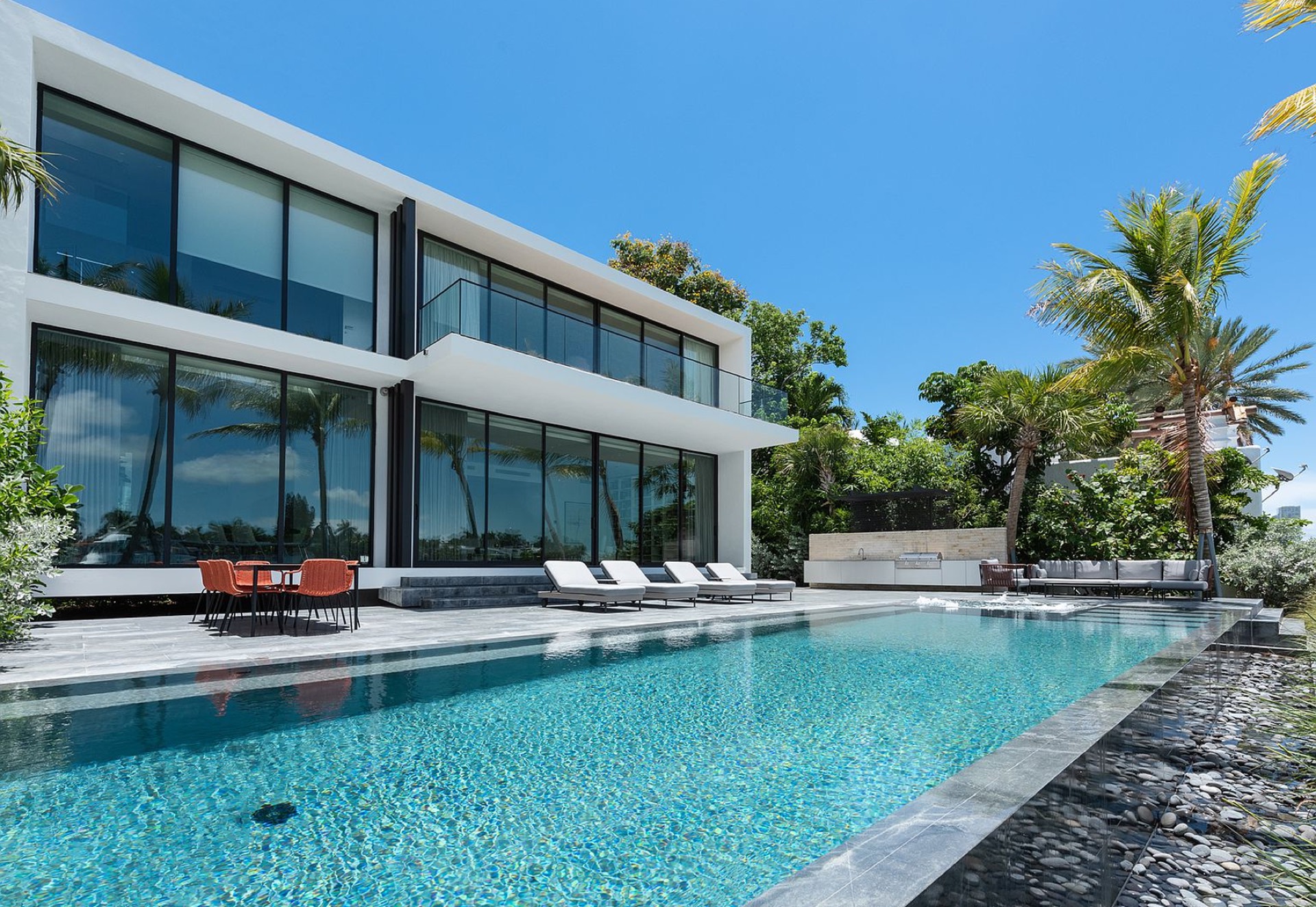 Hibiscus Residence — floor-to-ceiling impact glass to the pool terrace