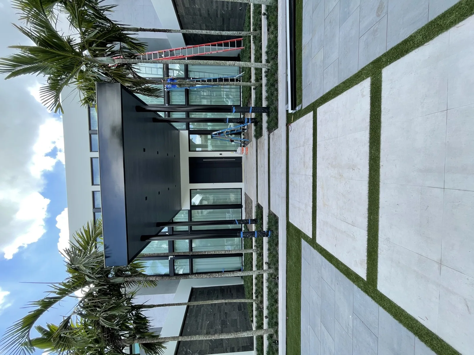 Glass storefront-style entrance with framed glazing
