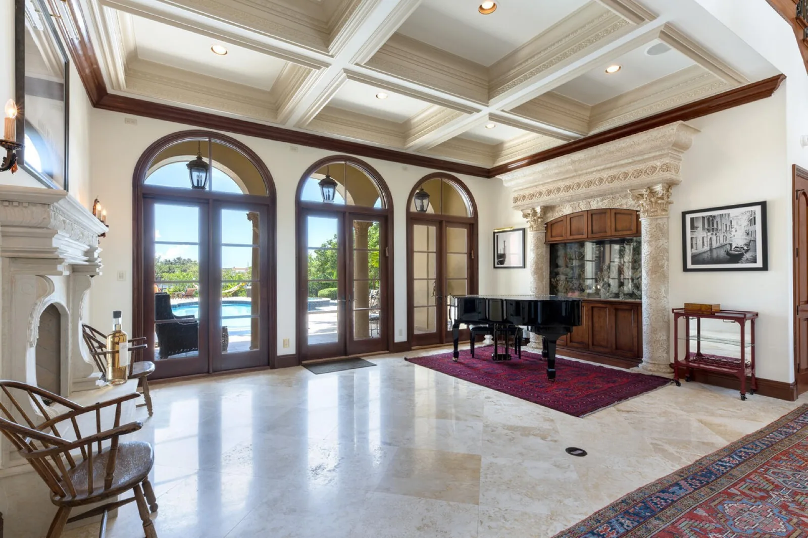 Wall of arched wood-framed glass doors