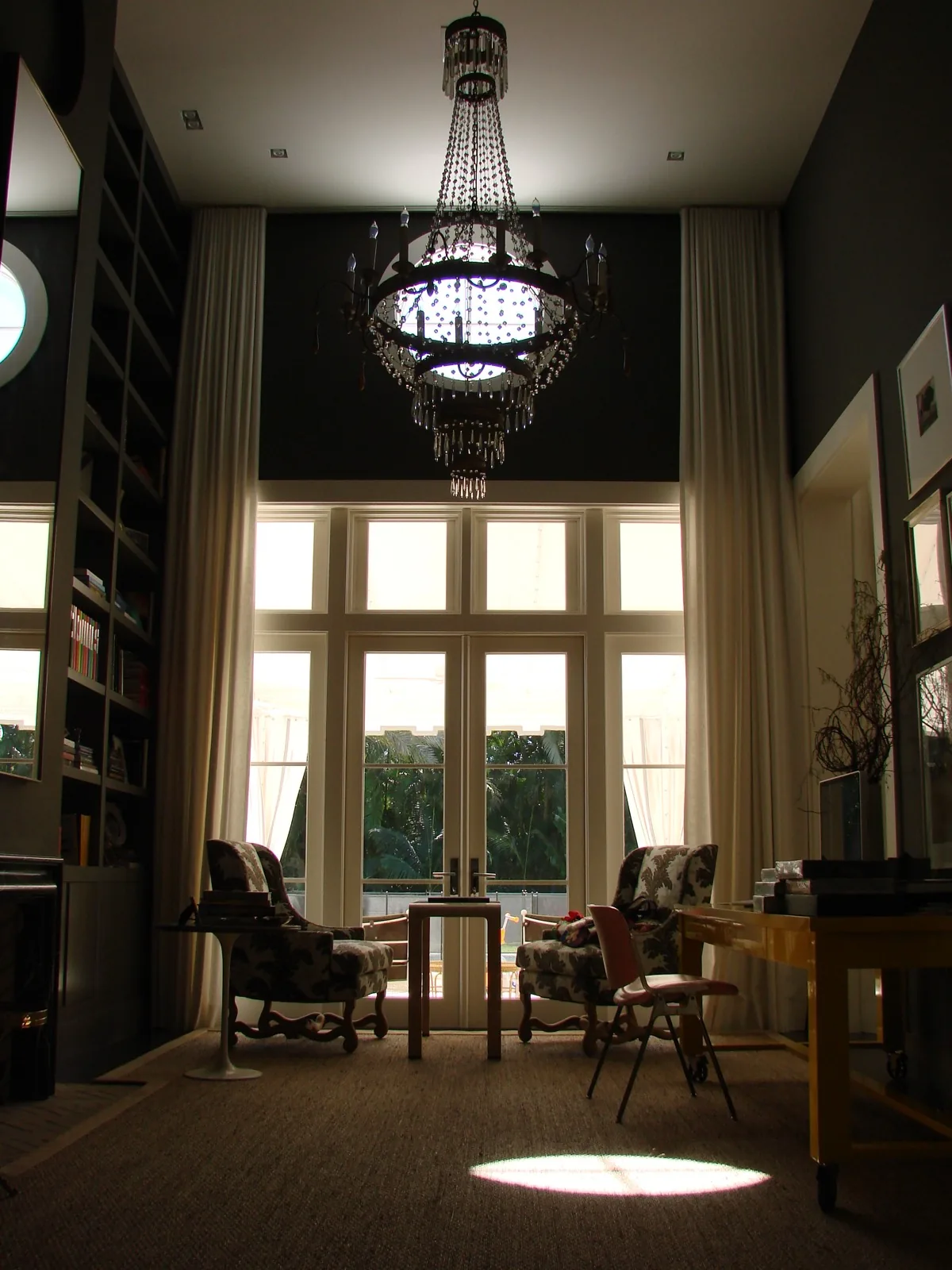 Traditional interior with French doors and transom windows