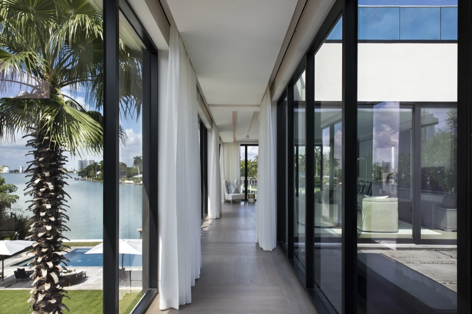Wide sliding glass door wall at dusk