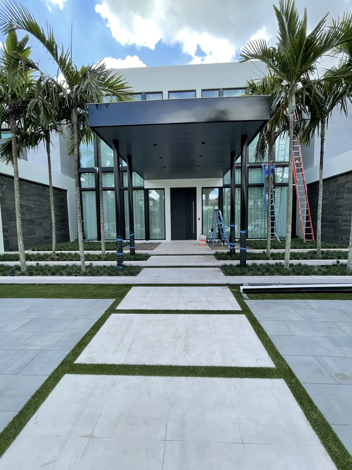 Glass storefront-style entrance with framed glazing