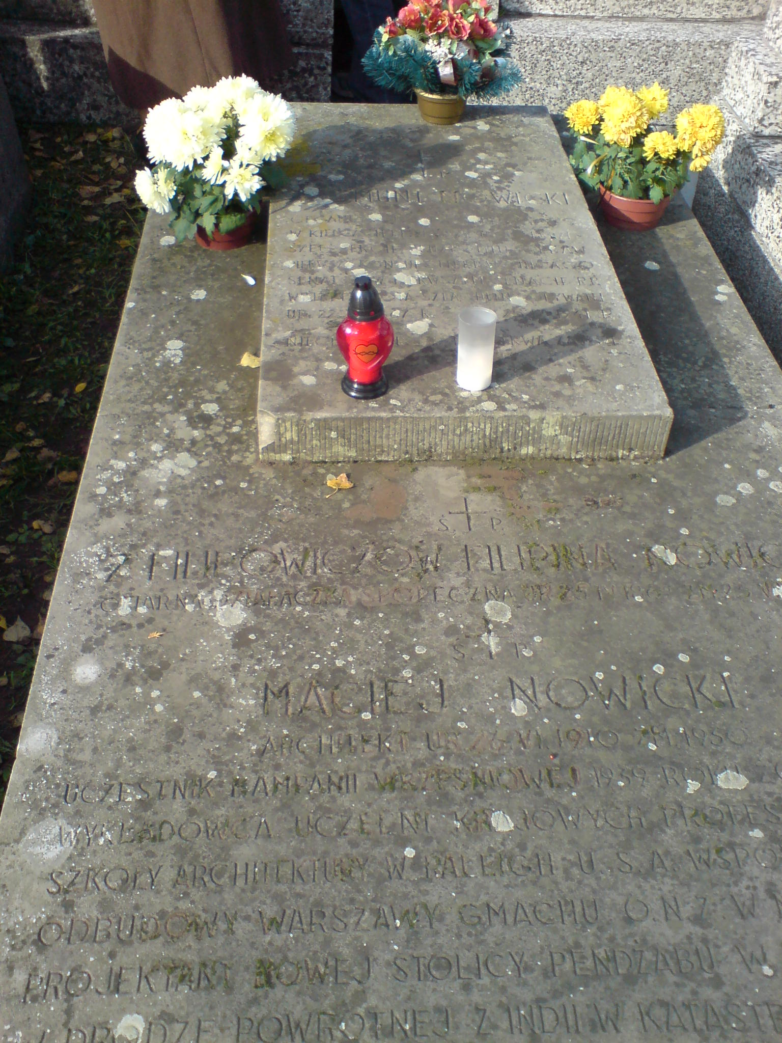 Candles burning on a grave