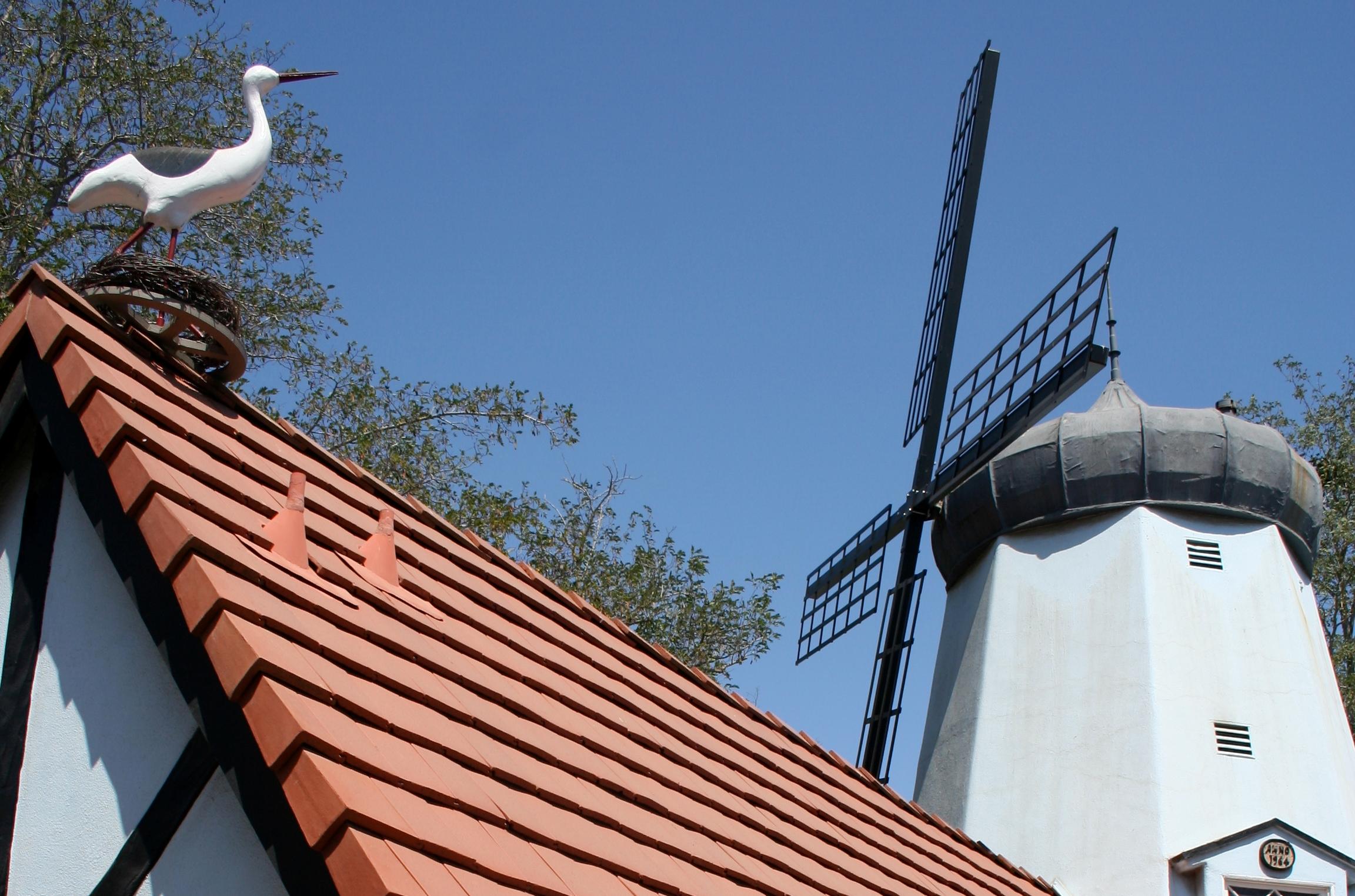 A windmill and rooftop stork in Solvang, California
