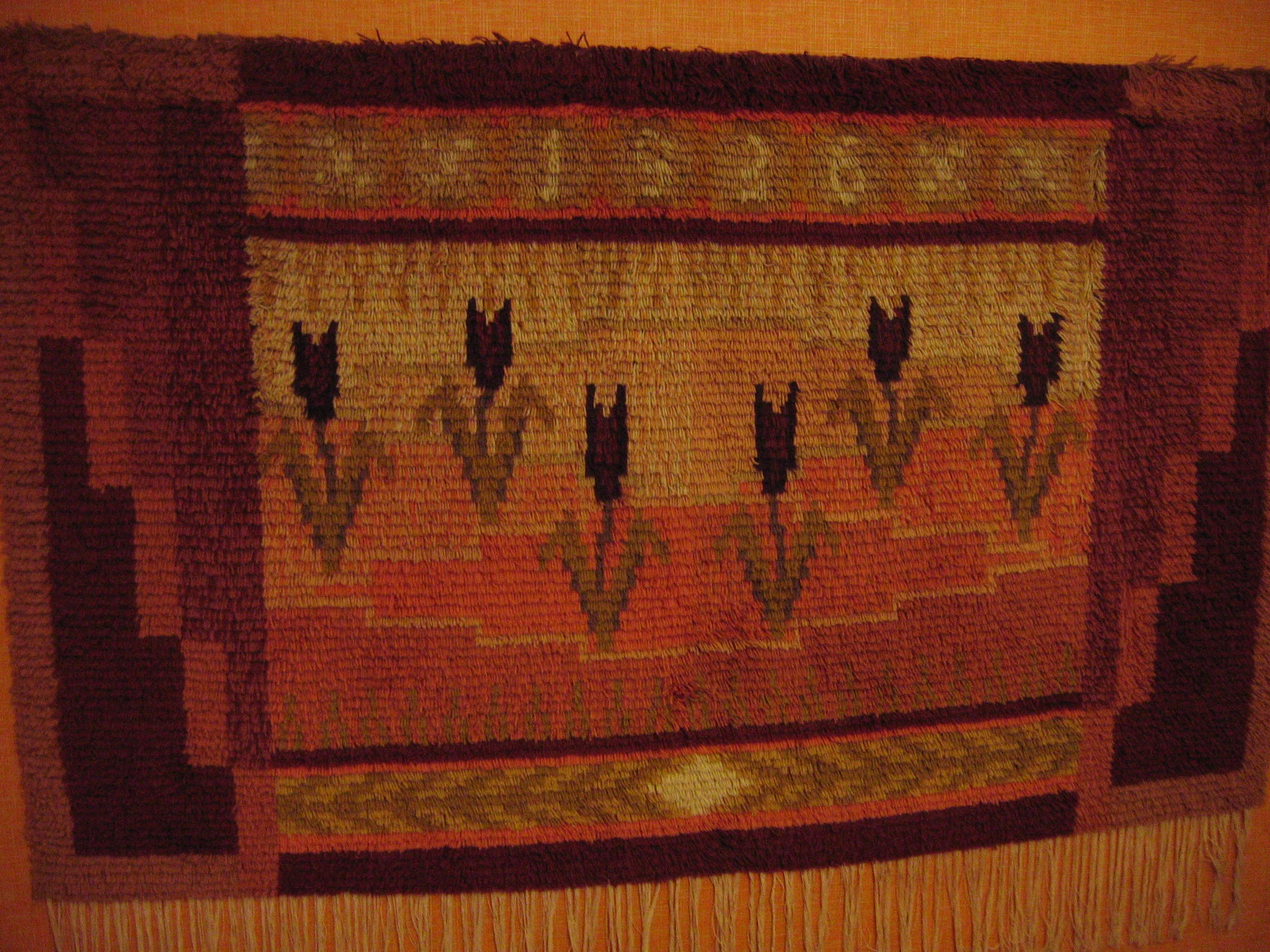 An old Finnish ryijy long-pile rug