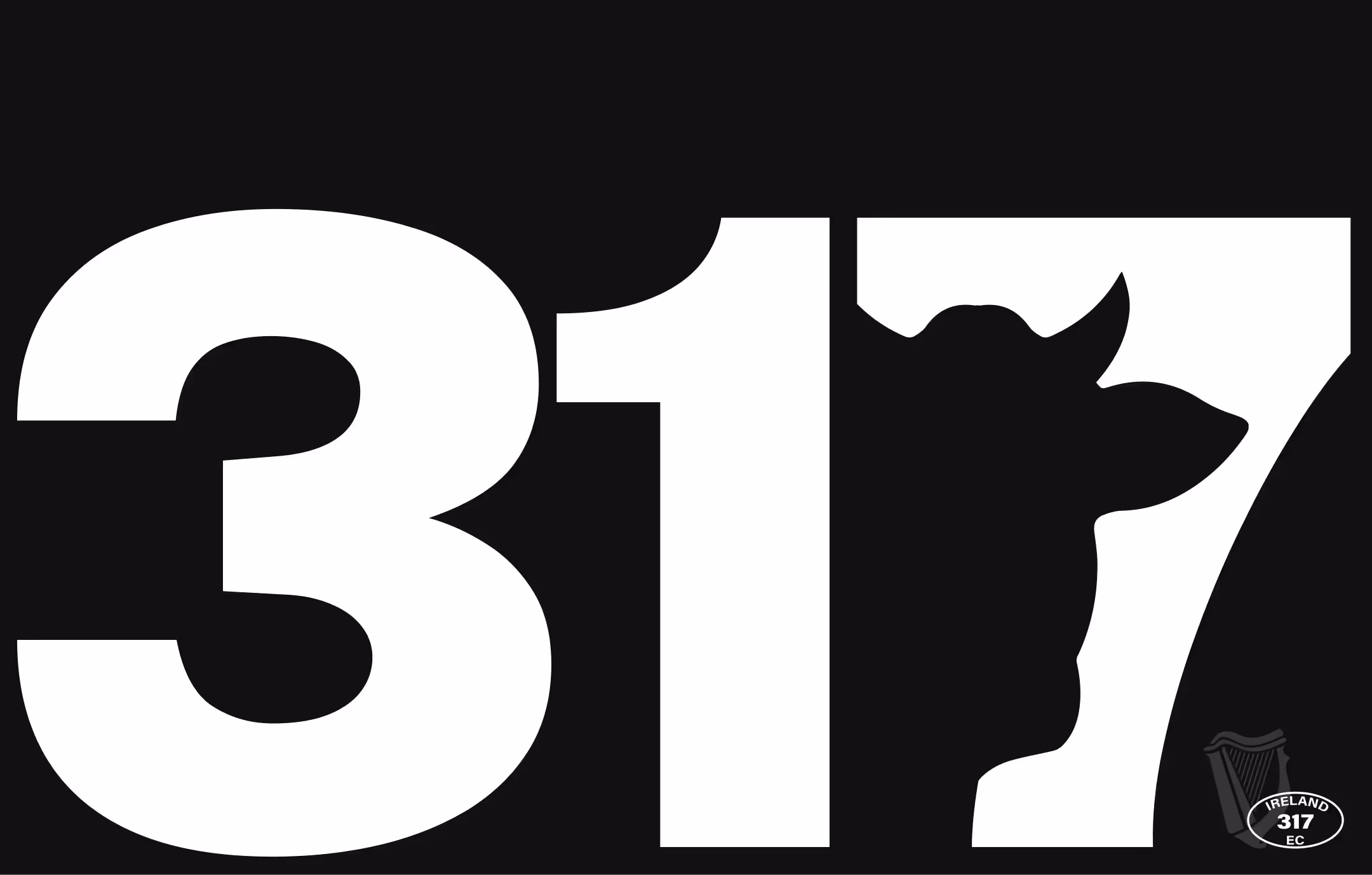 White '317' wordmark with cow‑head cut‑out displayed on a black background.