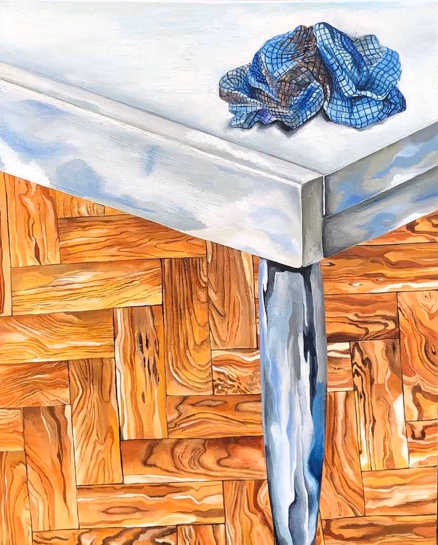 Oil painting of dirty j cloth on corner of table.