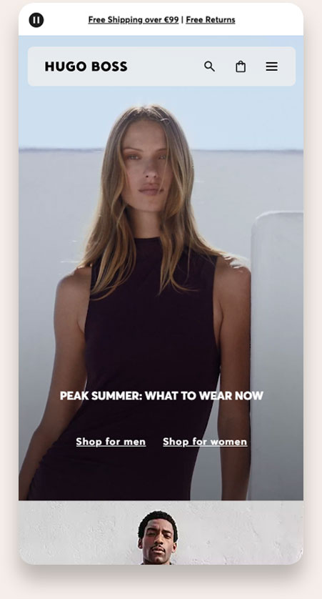 Mobile view of Hugo Boss website homepage showing a woman in a sleeveless dark dress under text 'PEAK SUMMER: WHAT TO WEAR NOW' with shopping links for men and women.