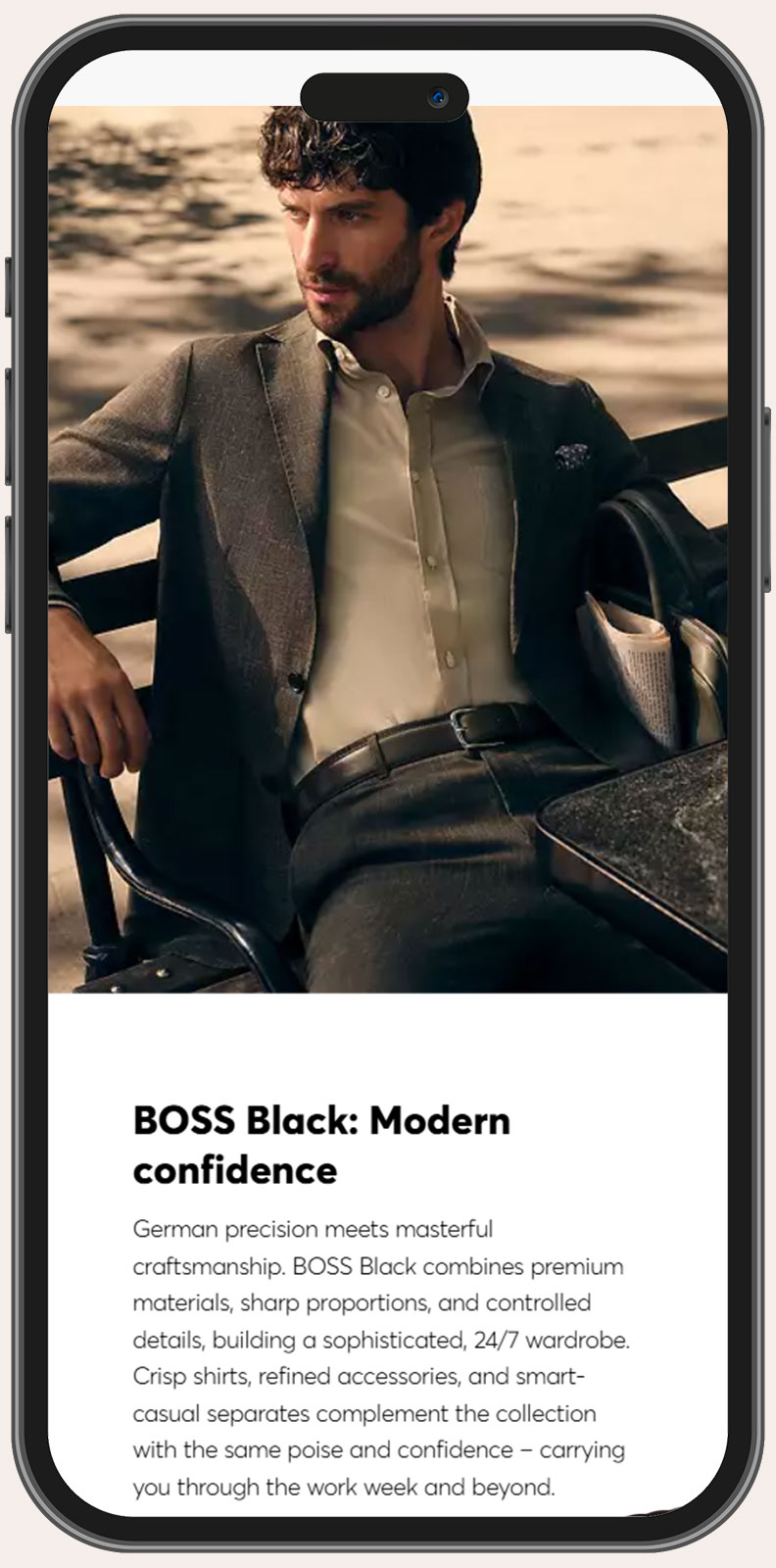 Man in a brown blazer and beige shirt sitting confidently at an outdoor cafe table with a newspaper and bag beside him, promoting BOSS Black fashion emphasizing modern confidence and craftsmanship.