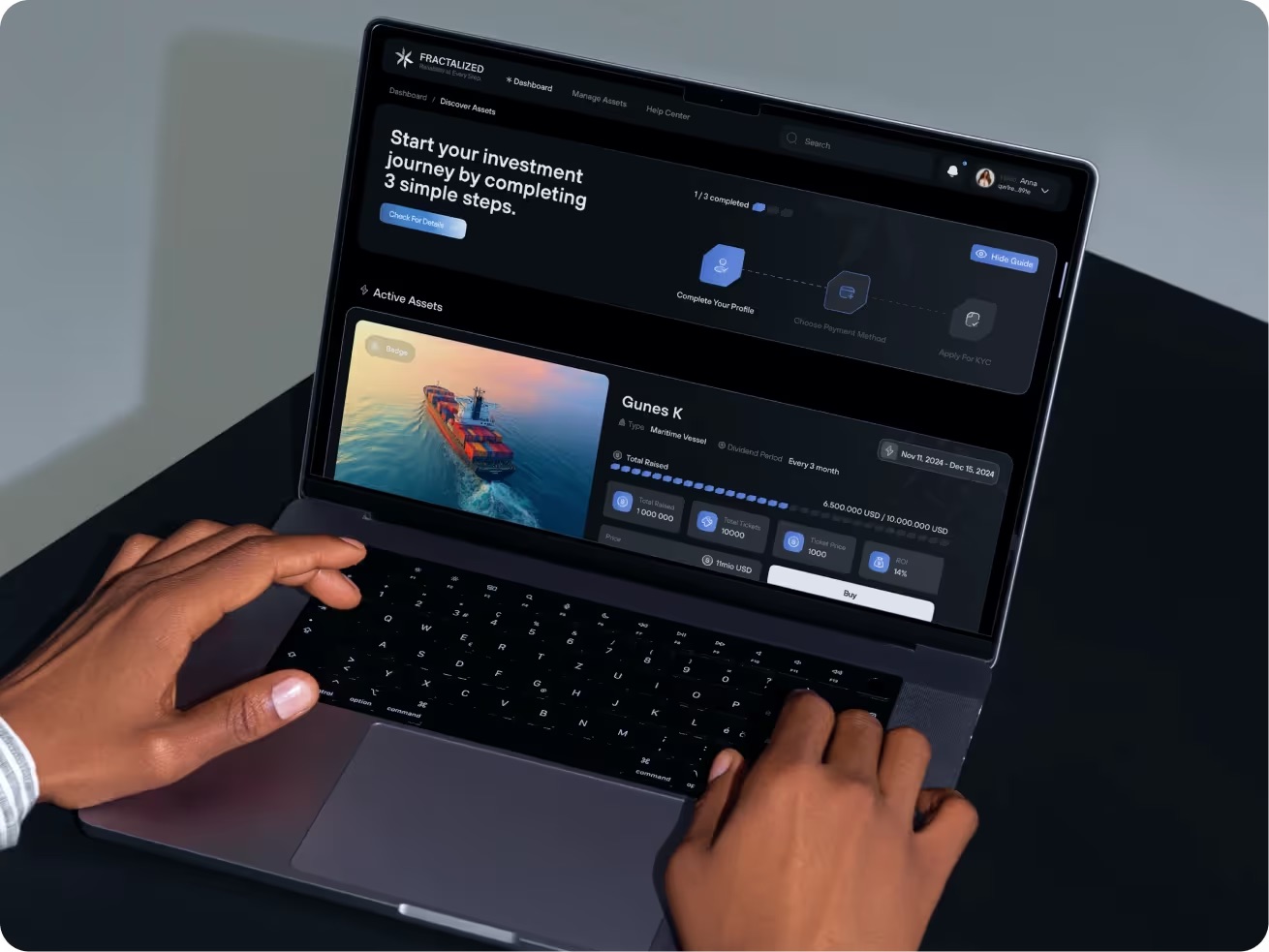 Hands on a laptop showing an investment platform interface. The screen displays investment steps and active assets with an image of a large red ship.