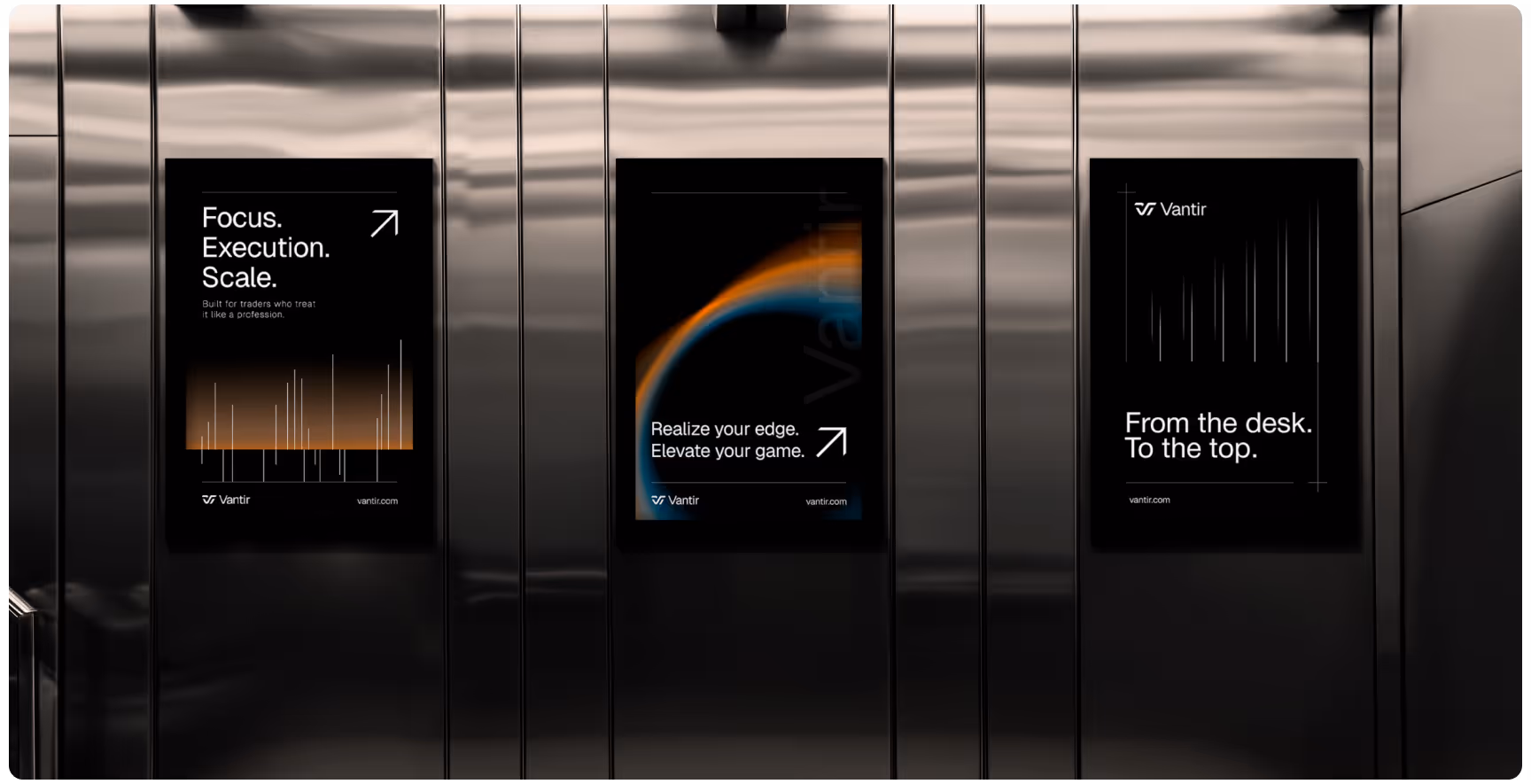 Three sleek, vertical posters on a reflective elevator wall convey motivational messages with graphs and upward arrows, emphasizing progress and ambition.