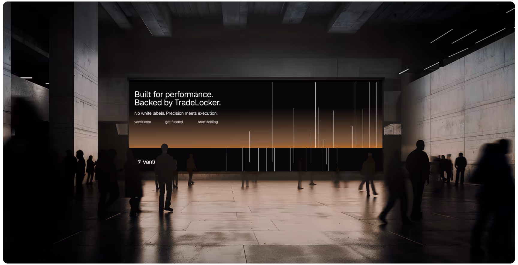 A dimly lit, modern interior with silhouetted figures walking on a shiny floor. A large, illuminated billboard reads "Built for performance. Backed by TradeLocker."